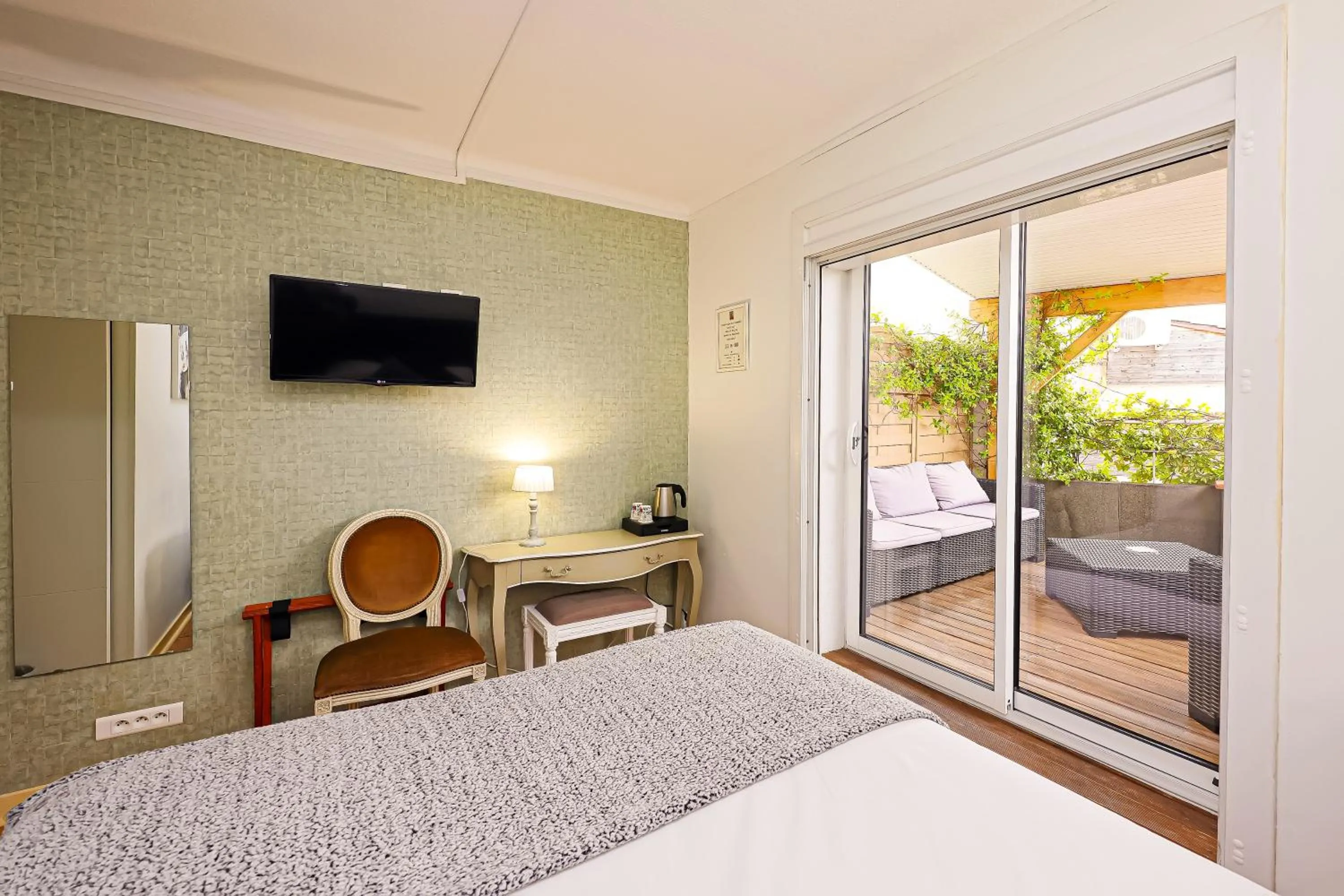 Bed in Hotel Les Pasteliers