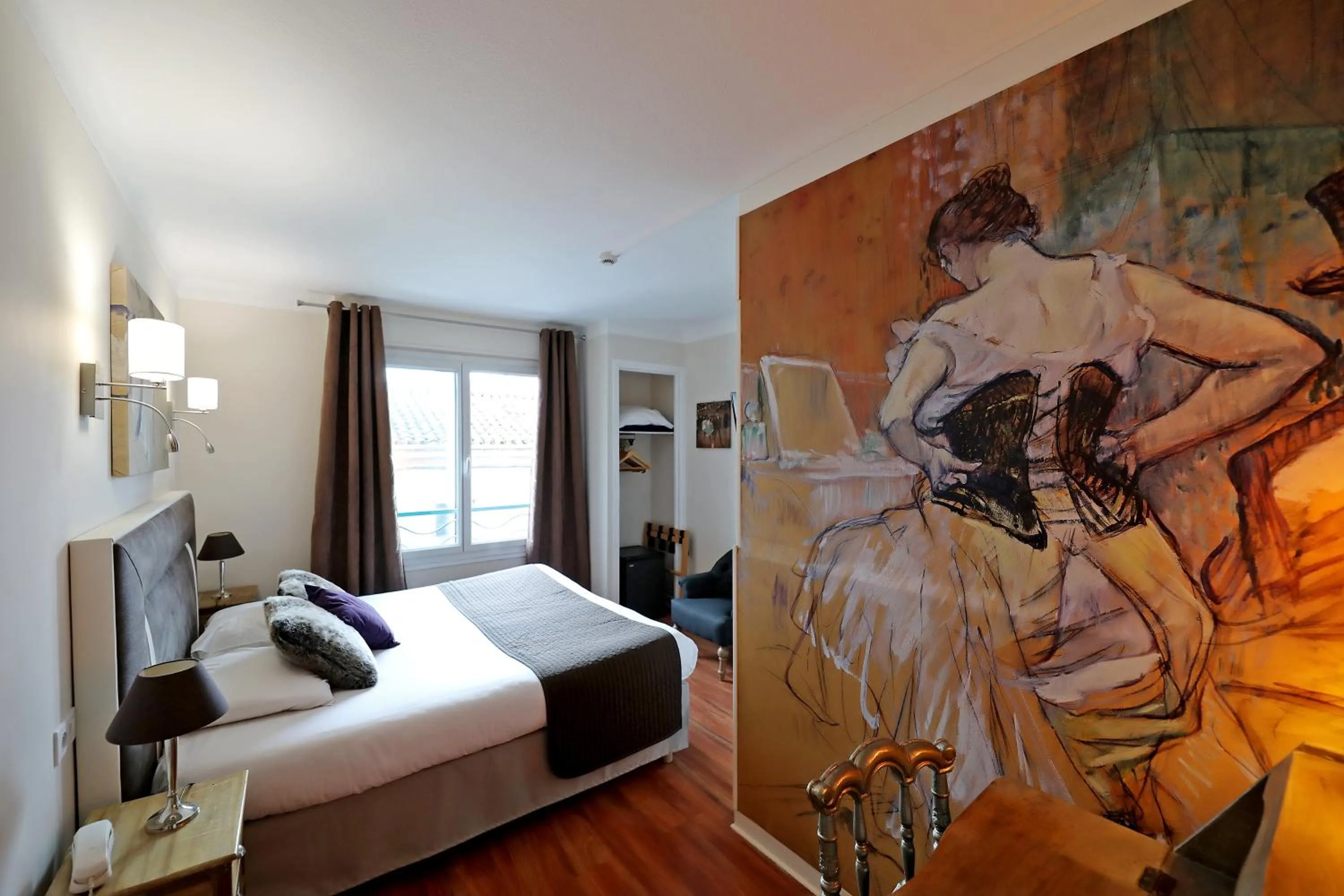 Bed in Hotel Les Pasteliers