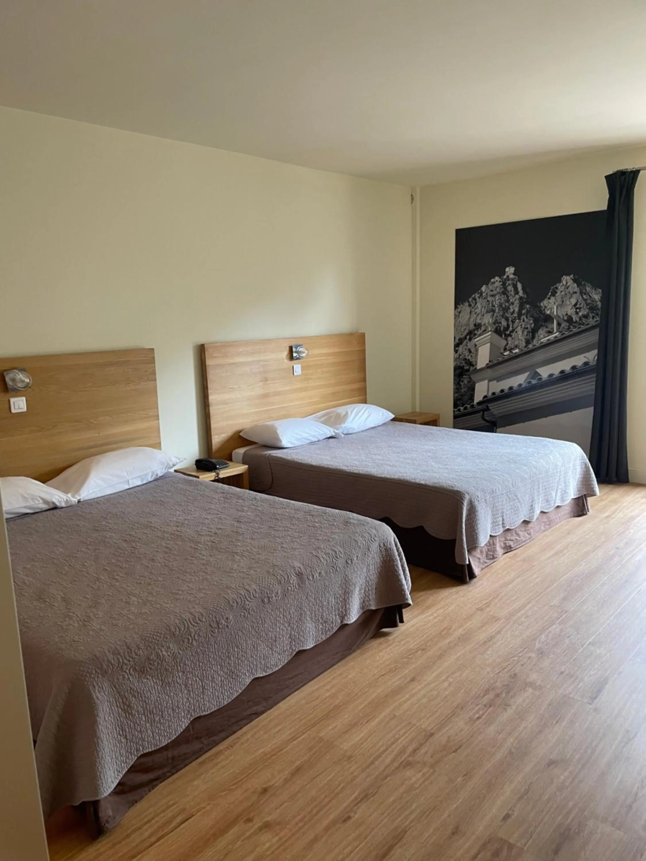 Photo of the whole room, Bed in Logis Hotel Le Lonca