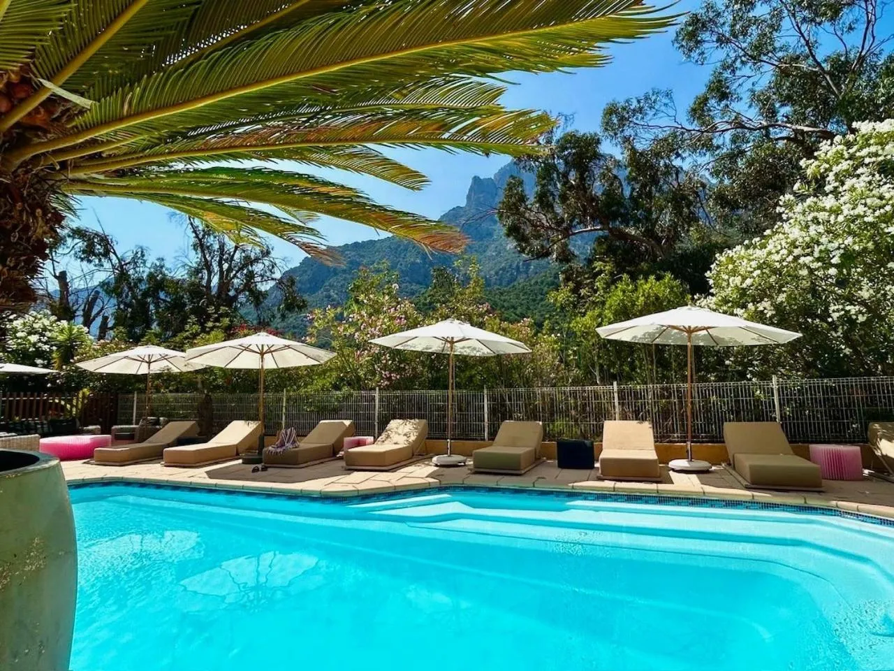 Swimming pool in Logis Hotel Le Lonca