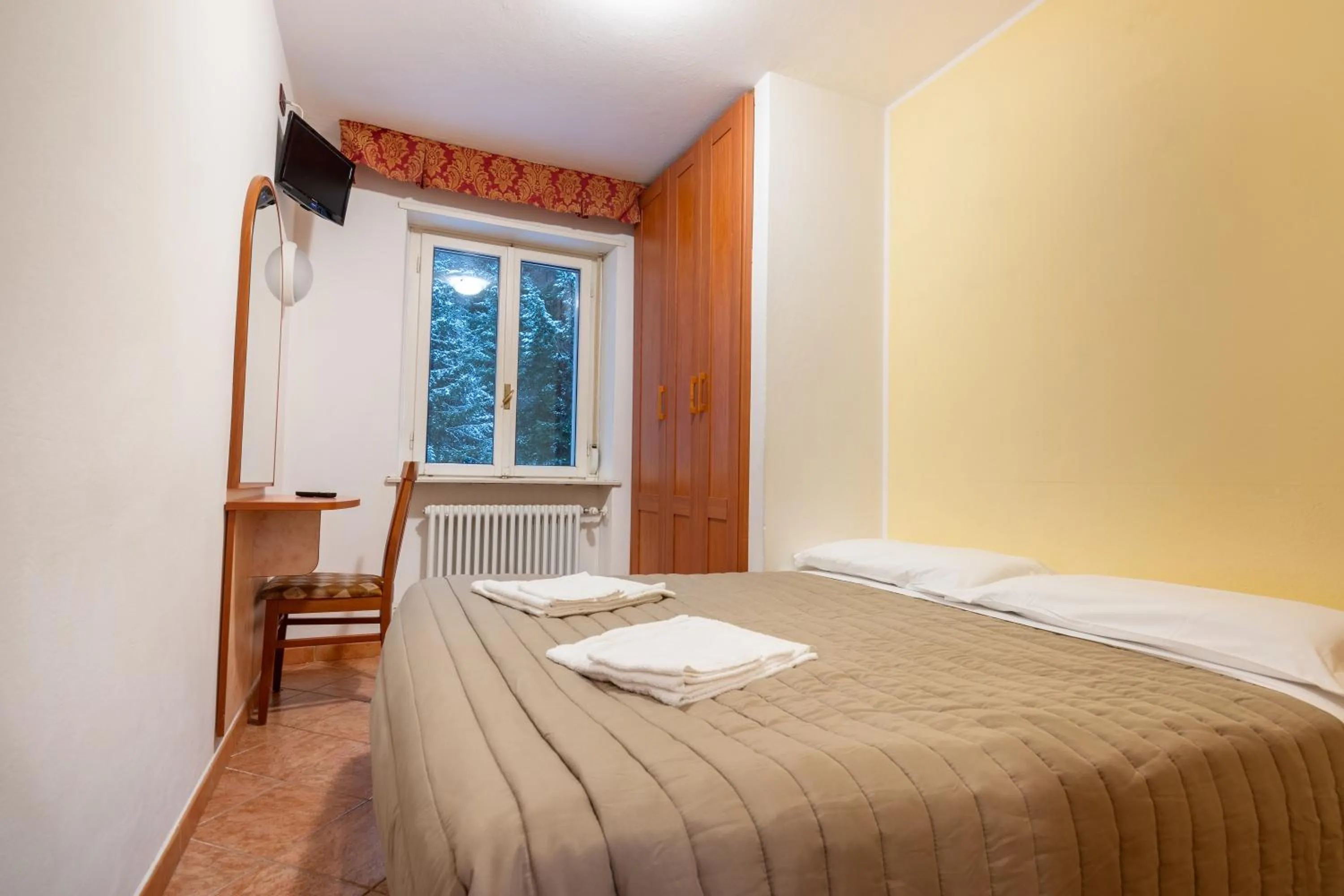 Bed in Hotel Zodiaco & Spa