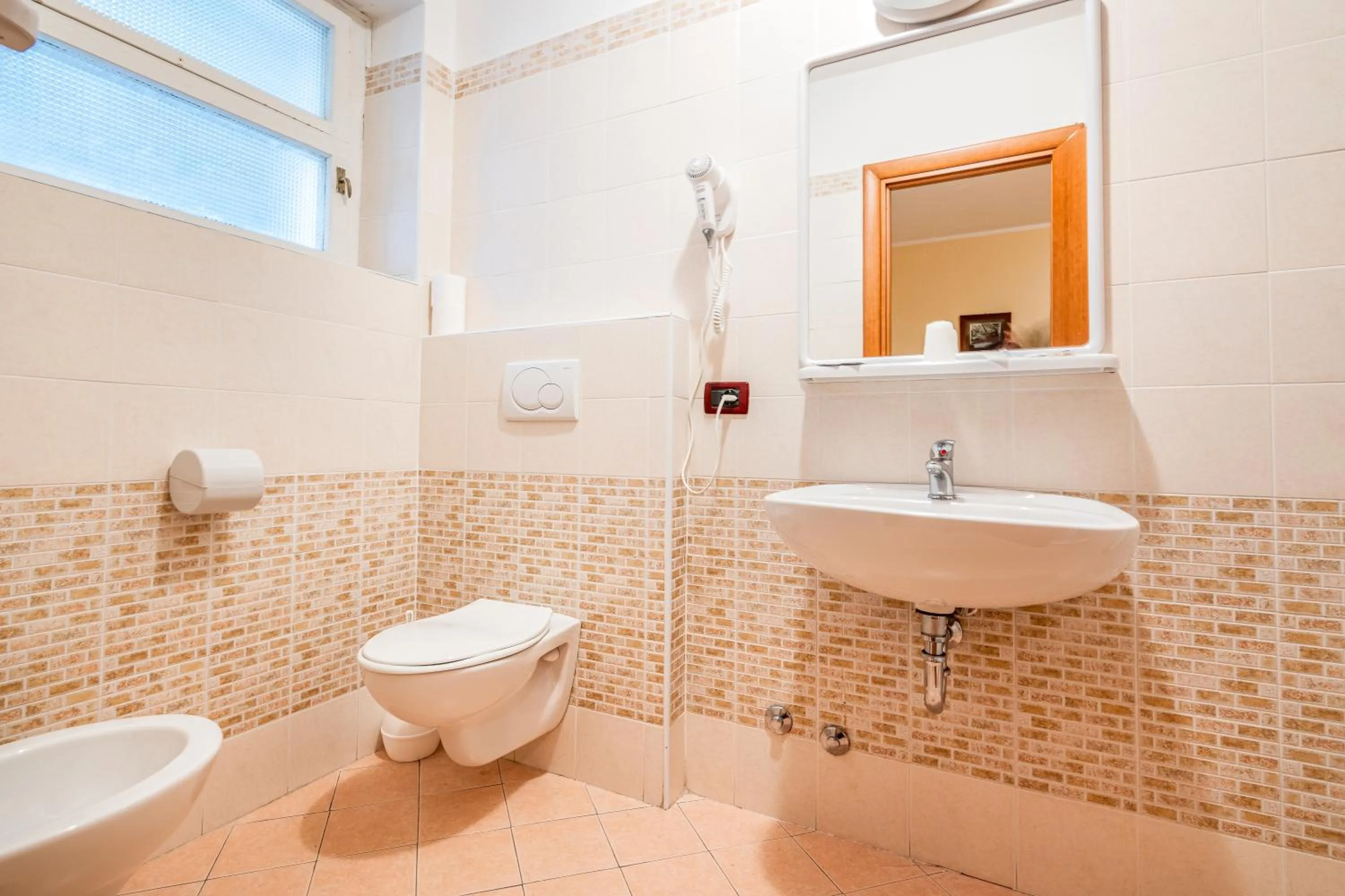 Toilet in Hotel Zodiaco & Spa