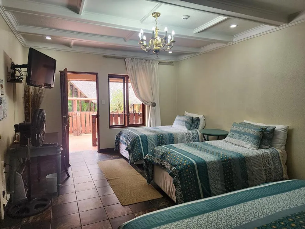 Bed in Goodnight Guest Lodge