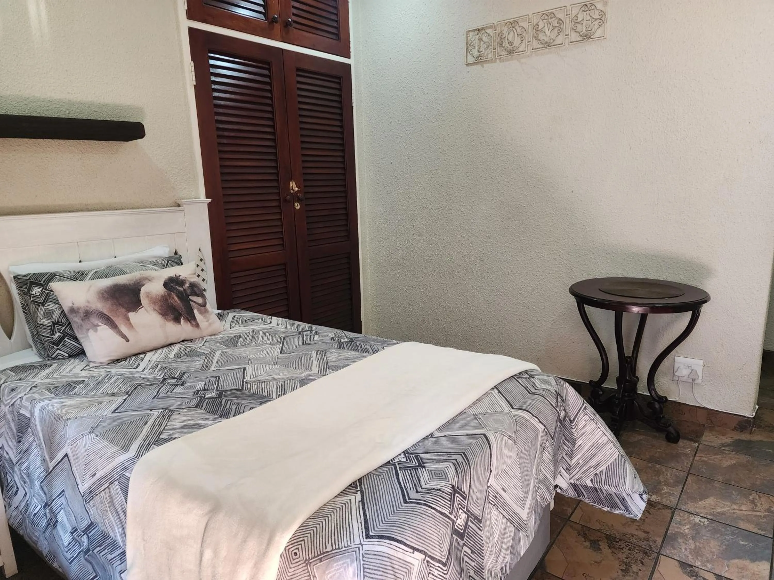 Bed in Goodnight Guest Lodge