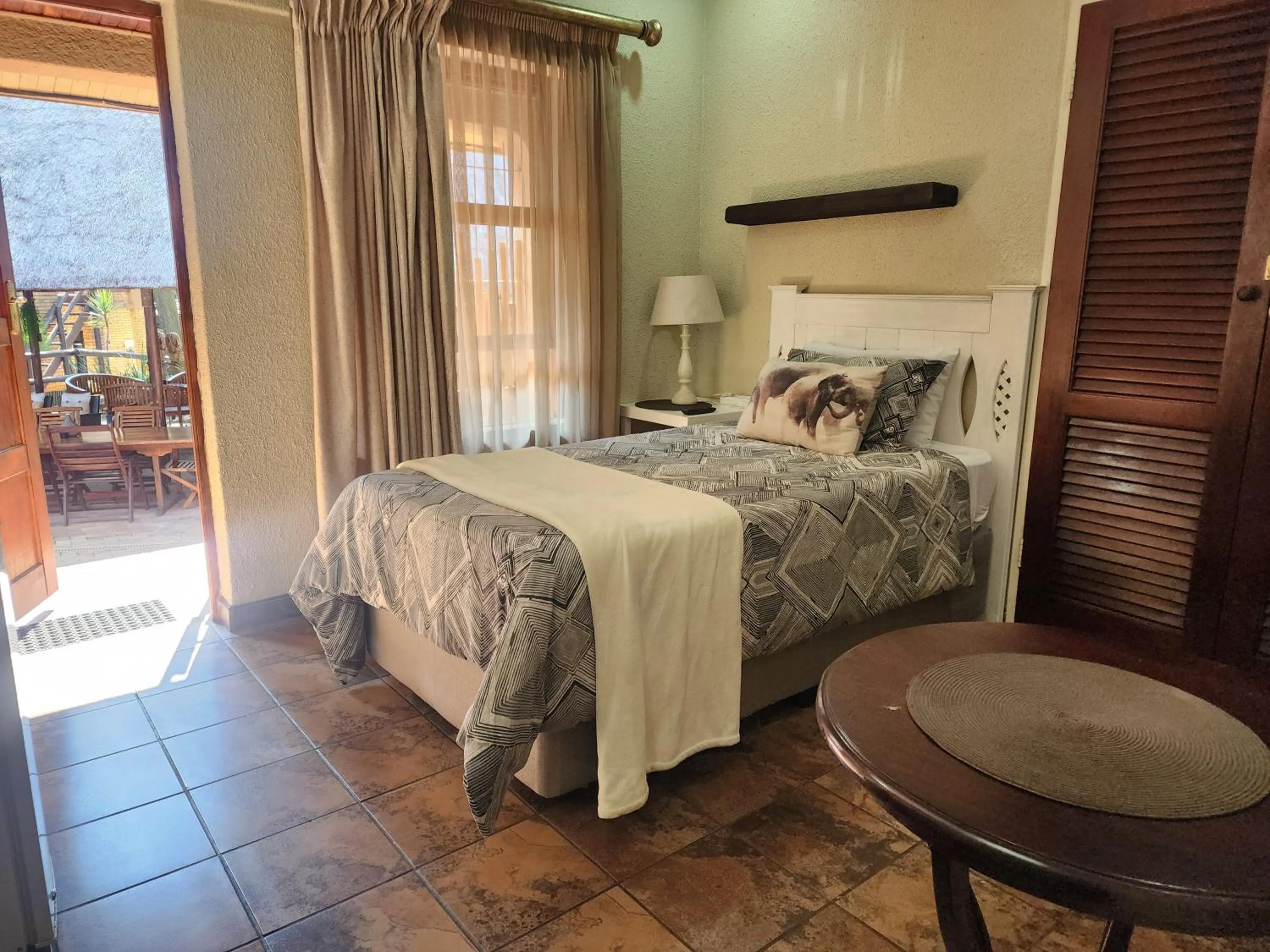 Bed in Goodnight Guest Lodge