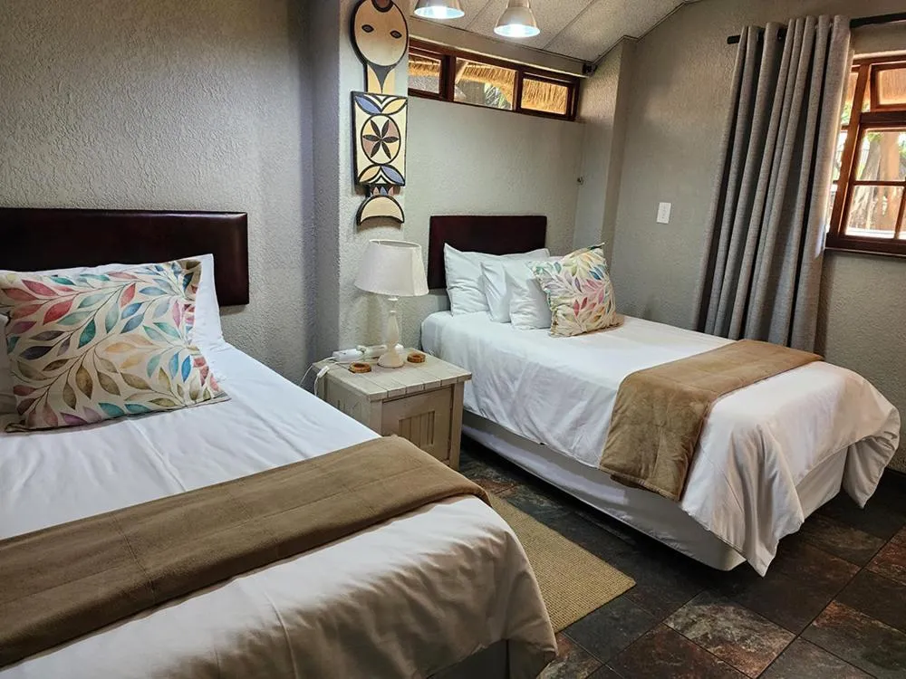 Bed in Goodnight Guest Lodge