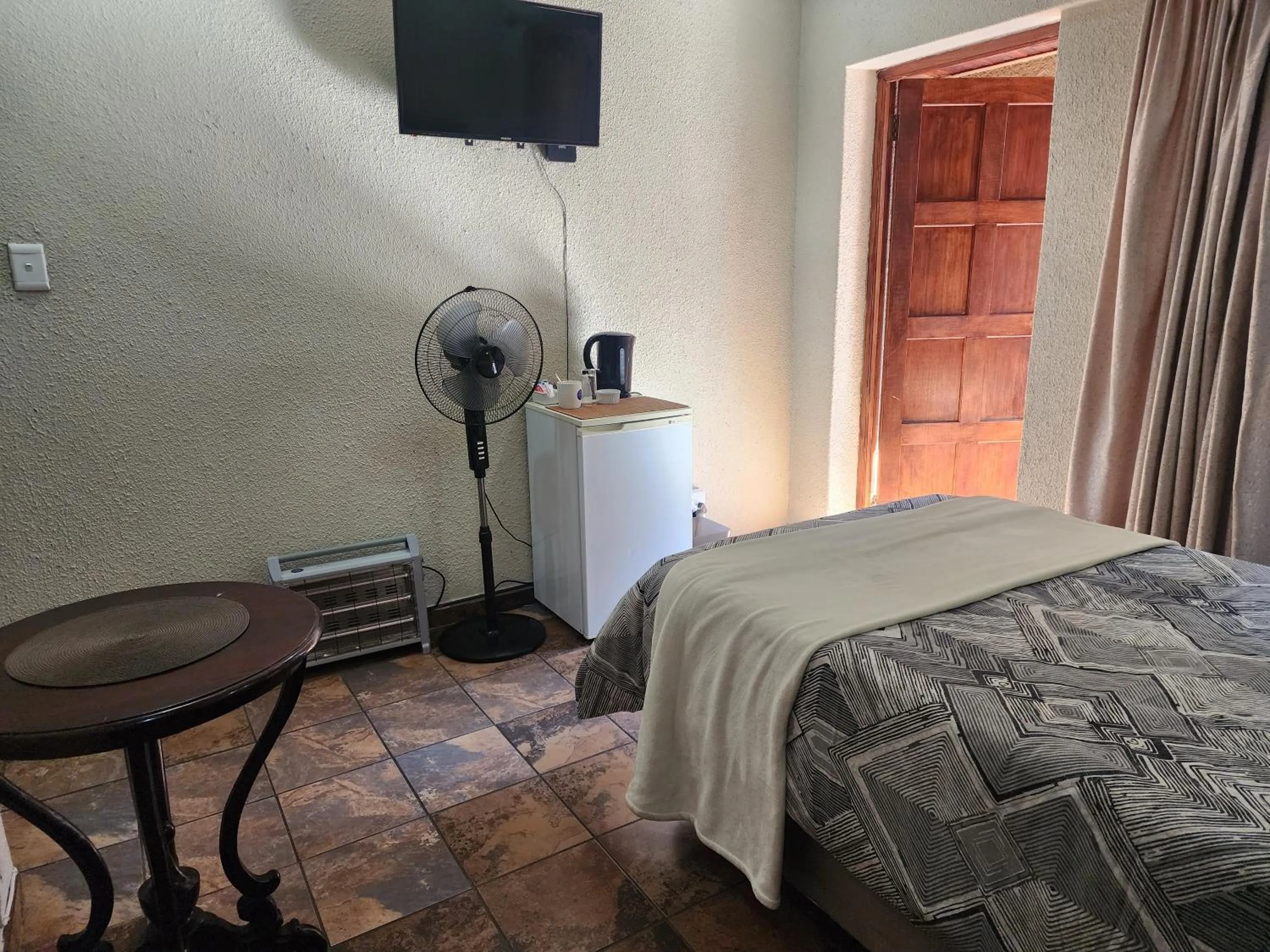 Bed in Goodnight Guest Lodge