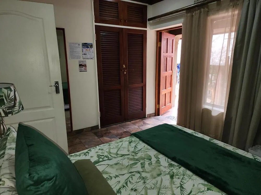 Bed in Goodnight Guest Lodge