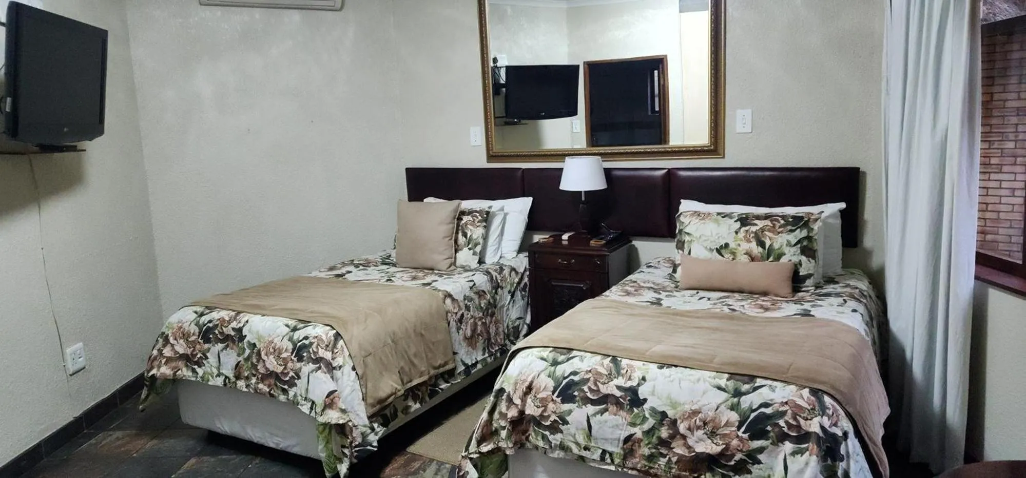 Bed in Goodnight Guest Lodge