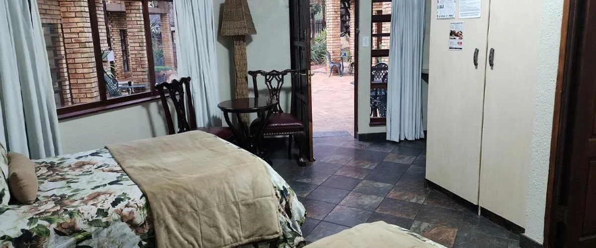 Bed in Goodnight Guest Lodge