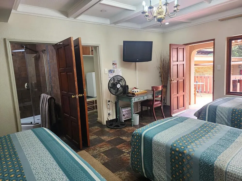 Bed in Goodnight Guest Lodge