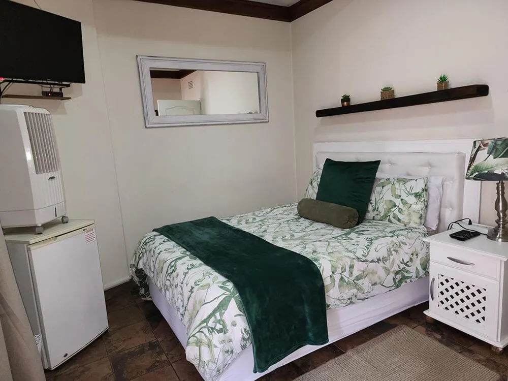 Bed in Goodnight Guest Lodge