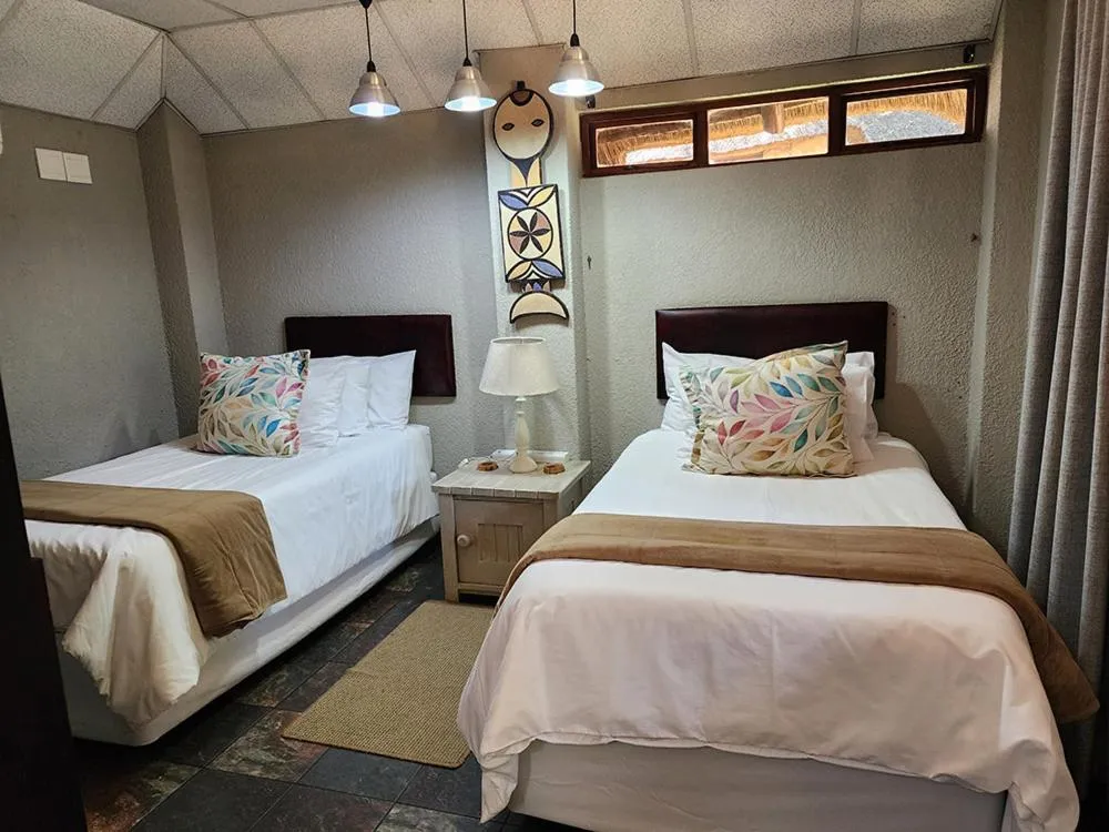 Bed in Goodnight Guest Lodge