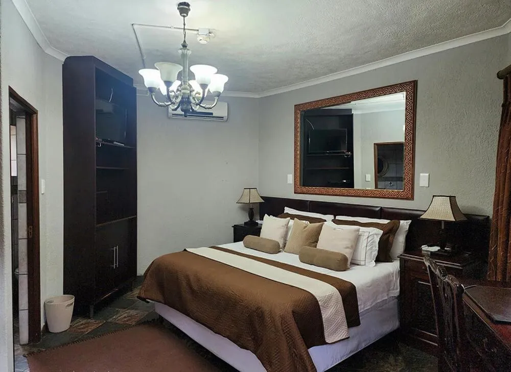 Bed in Goodnight Guest Lodge