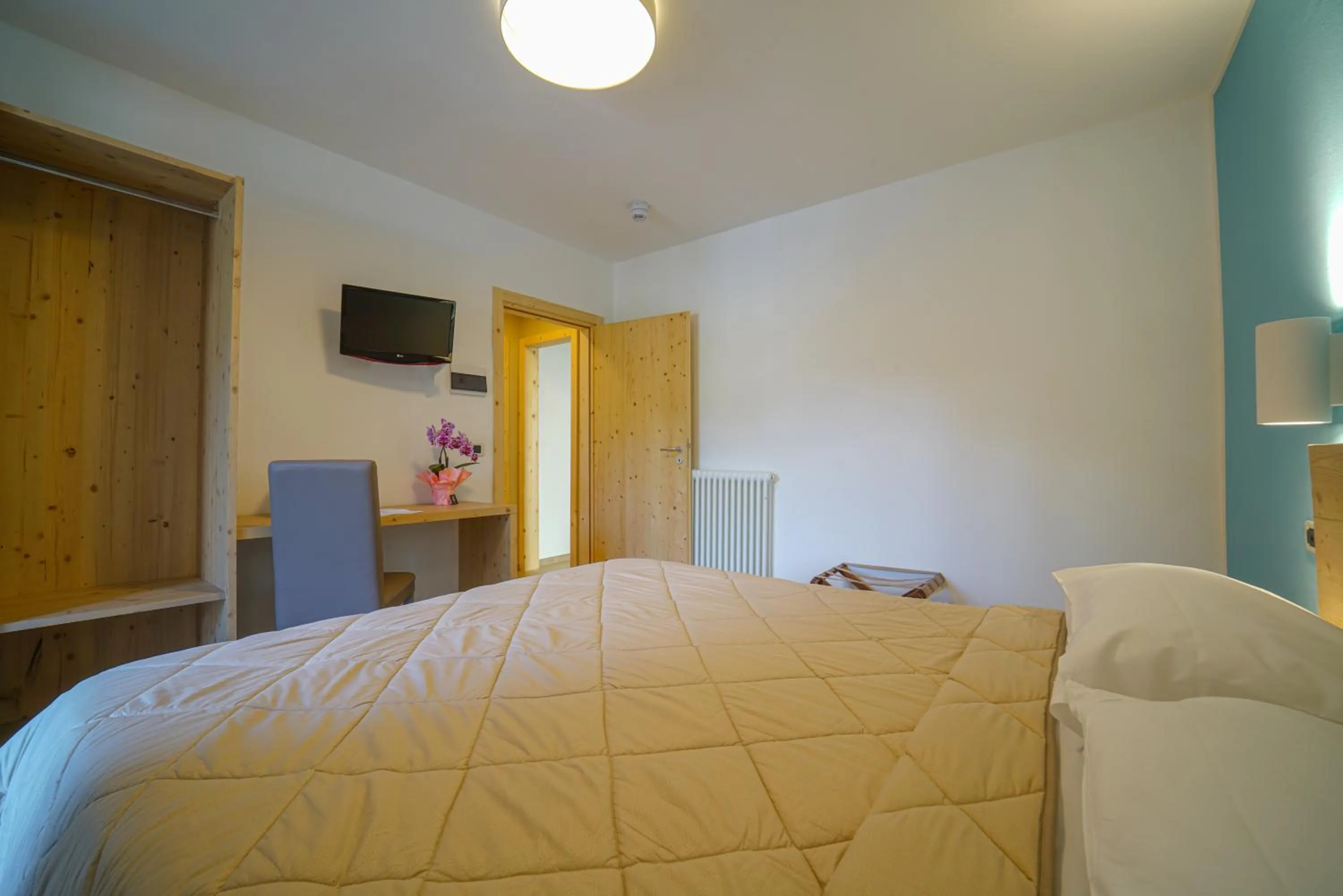 Bedroom, Bed in GH Hotel Monzoni