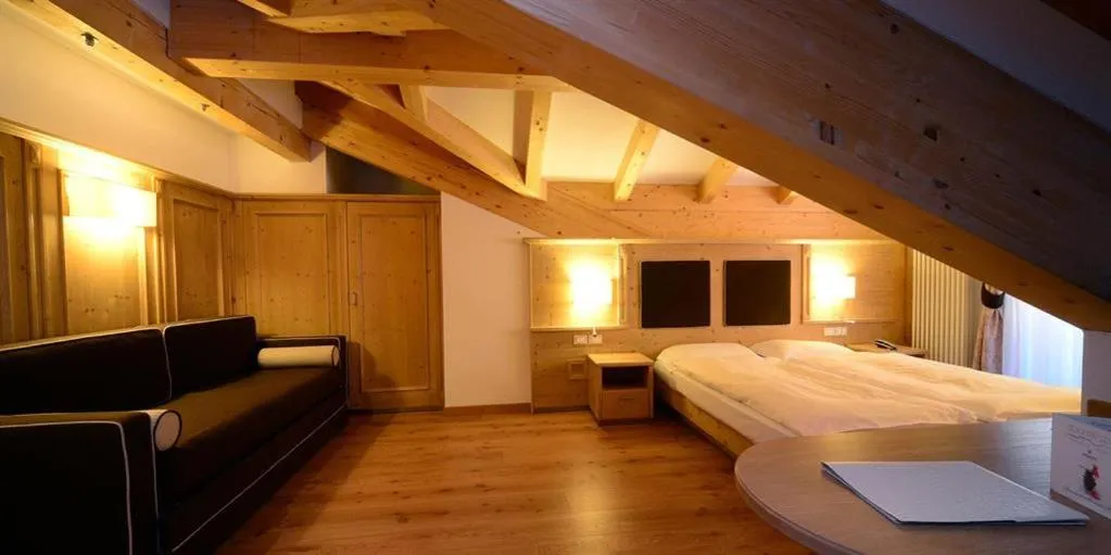 Bed in Hotel Crozzon