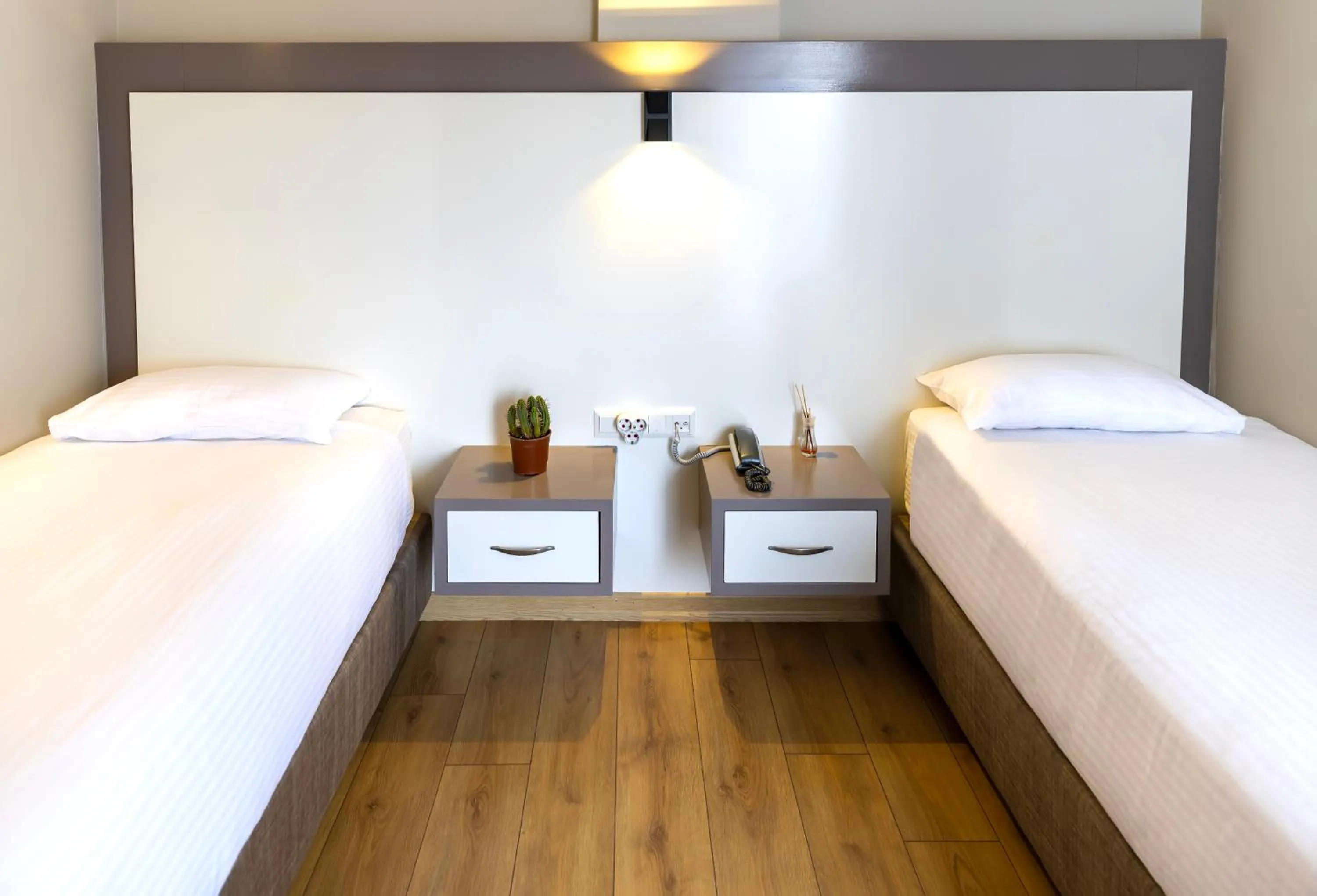 Bed in Mene City Hotel