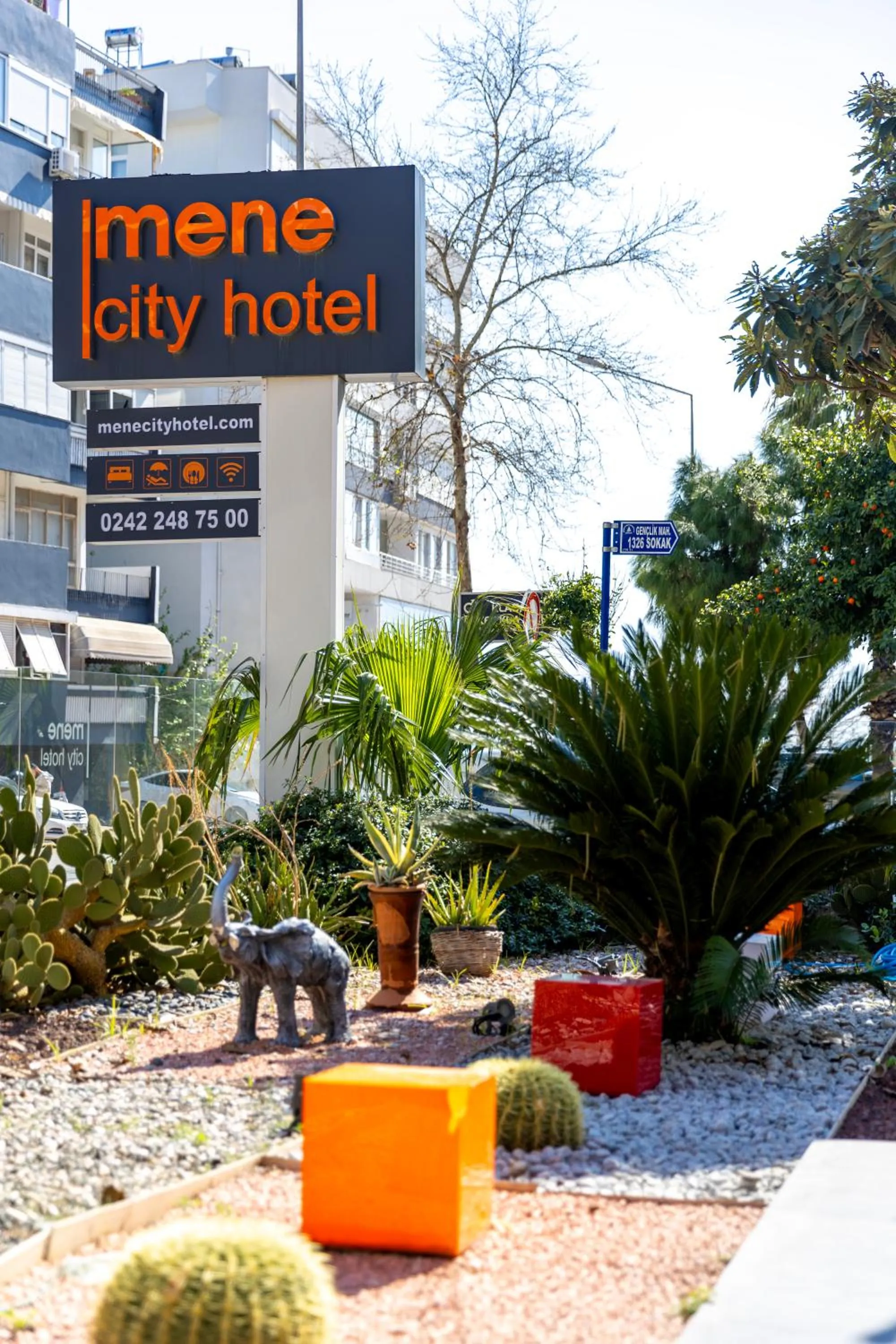 Property logo or sign in Mene City Hotel