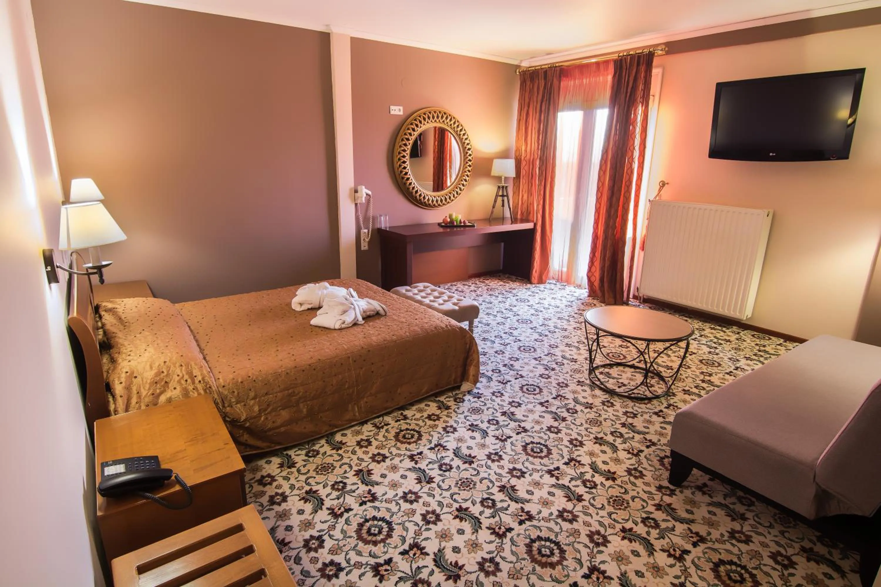 Bed in Hotel Alexandros