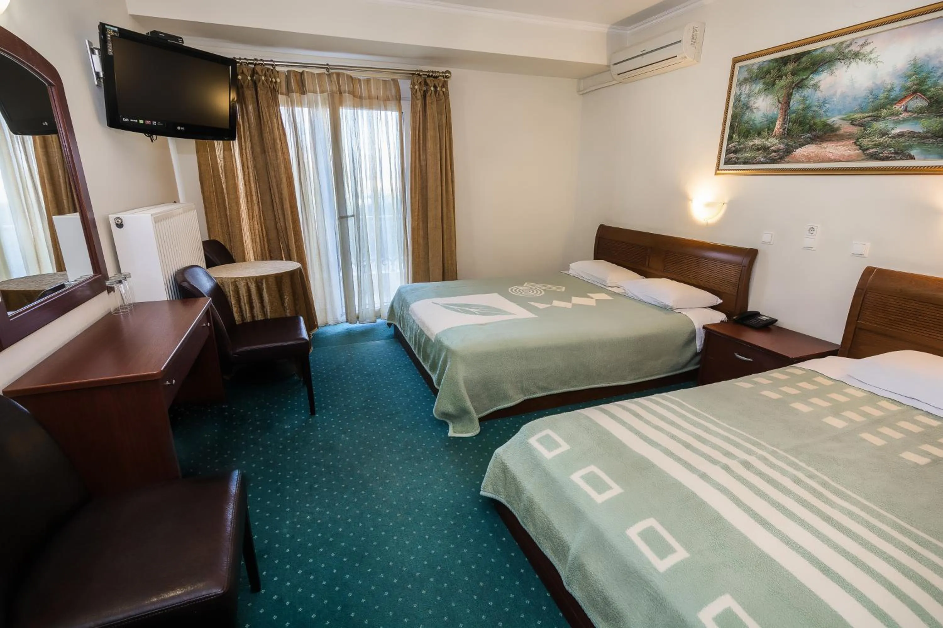 TV and multimedia, Bed in Hotel Alexandros