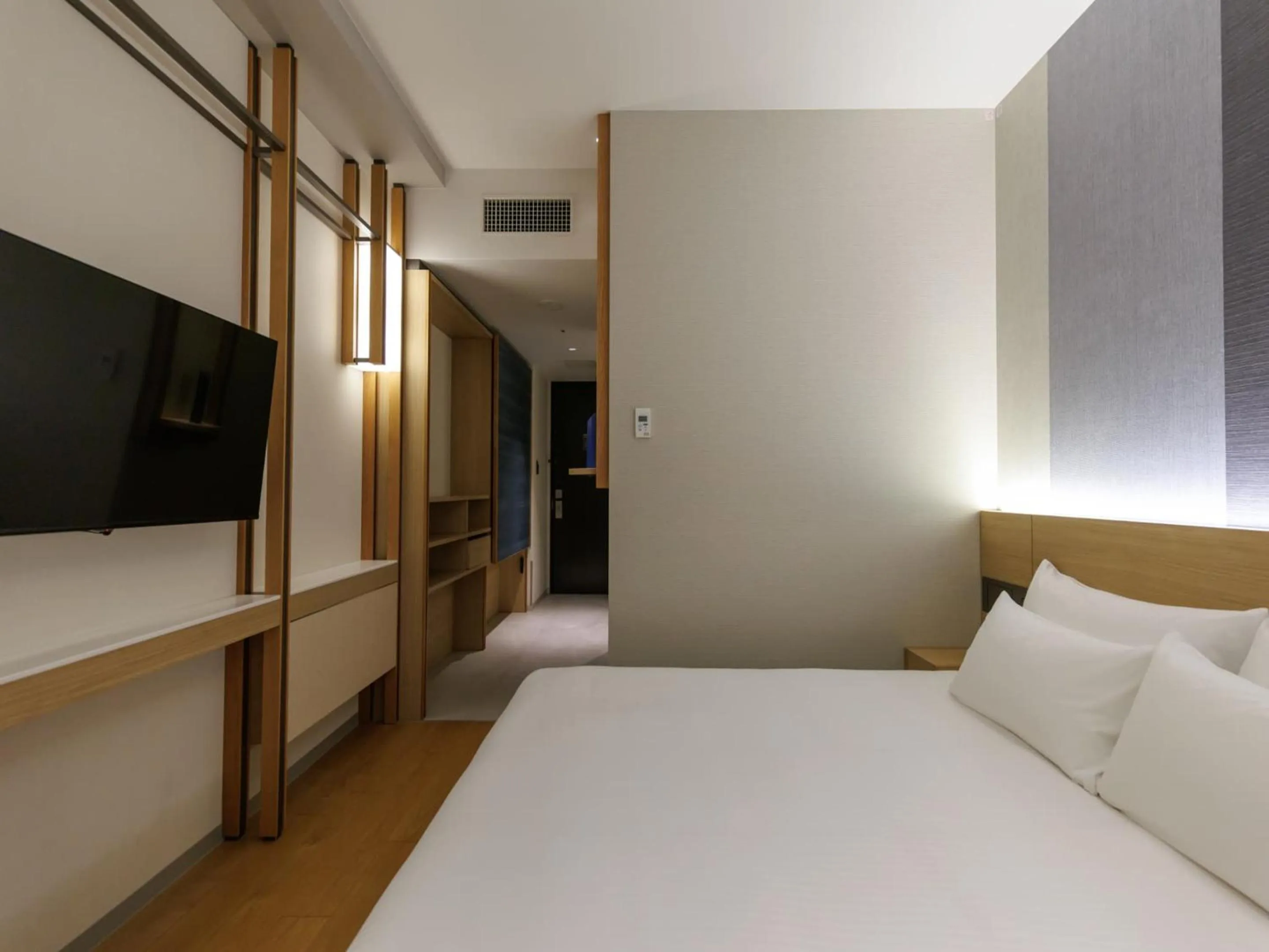 Photo of the whole room, Bed in JR Kyushu Hotel Blossom Naha