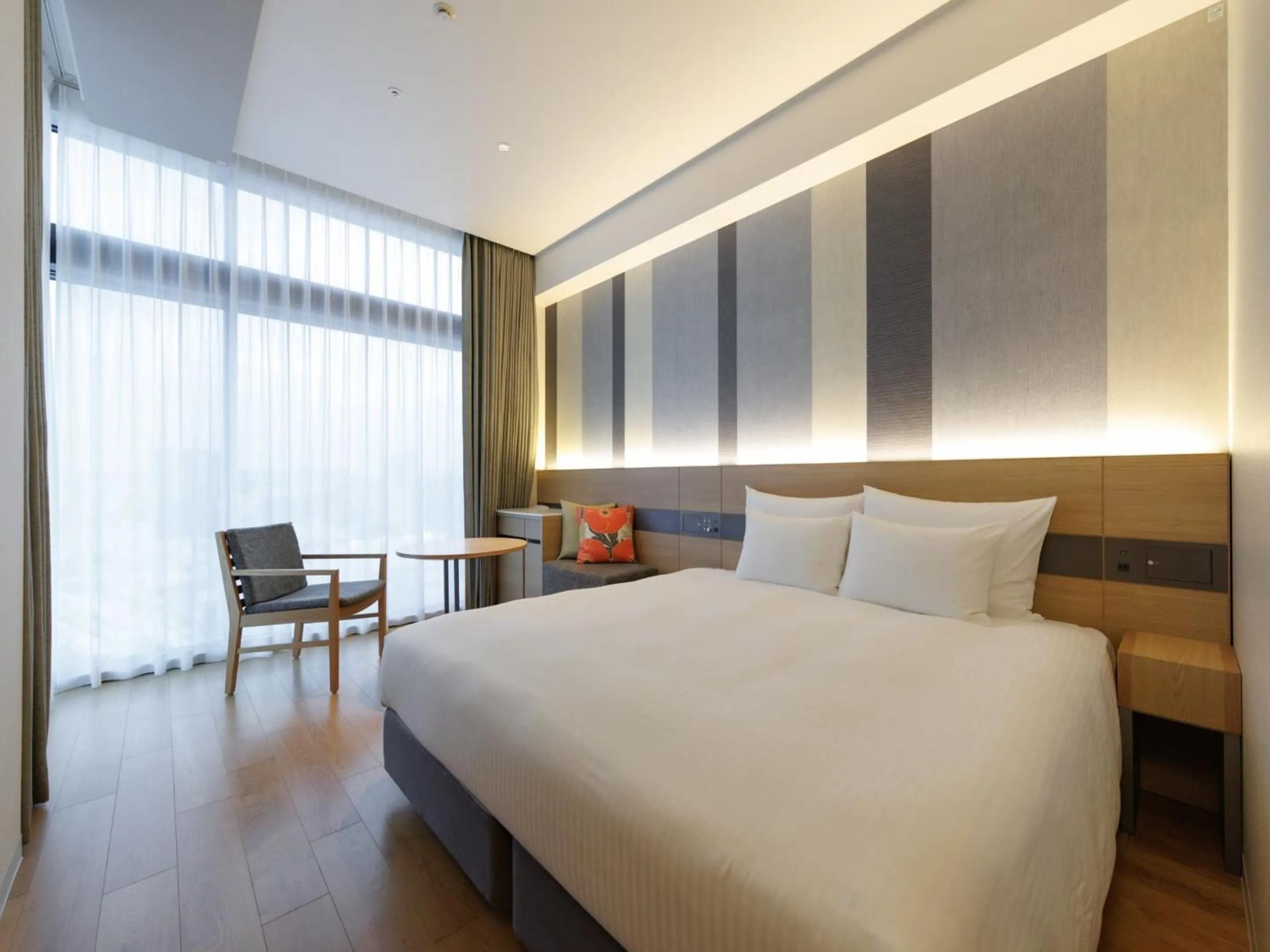 Photo of the whole room, Bed in JR Kyushu Hotel Blossom Naha