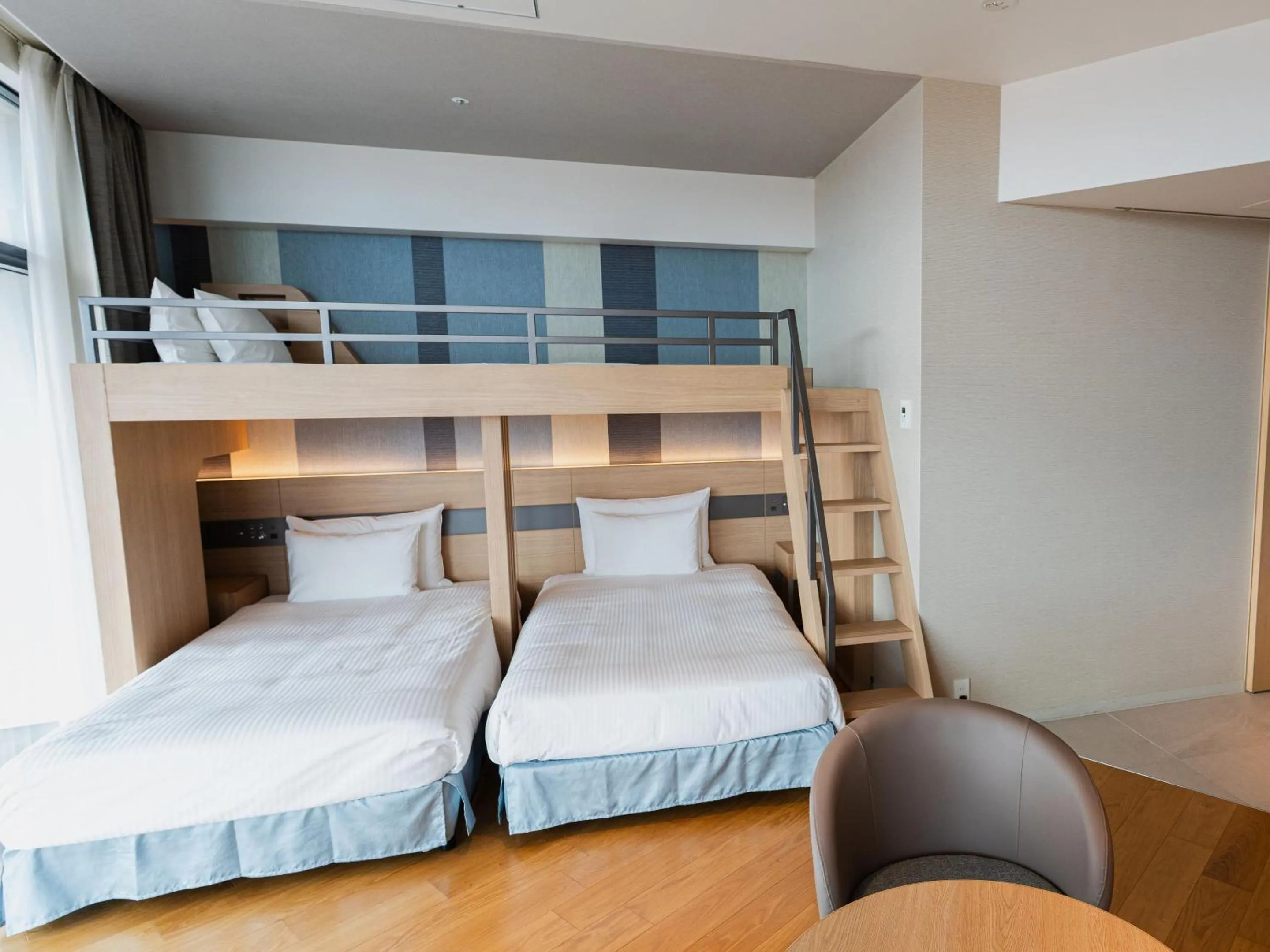 Bed in JR Kyushu Hotel Blossom Naha