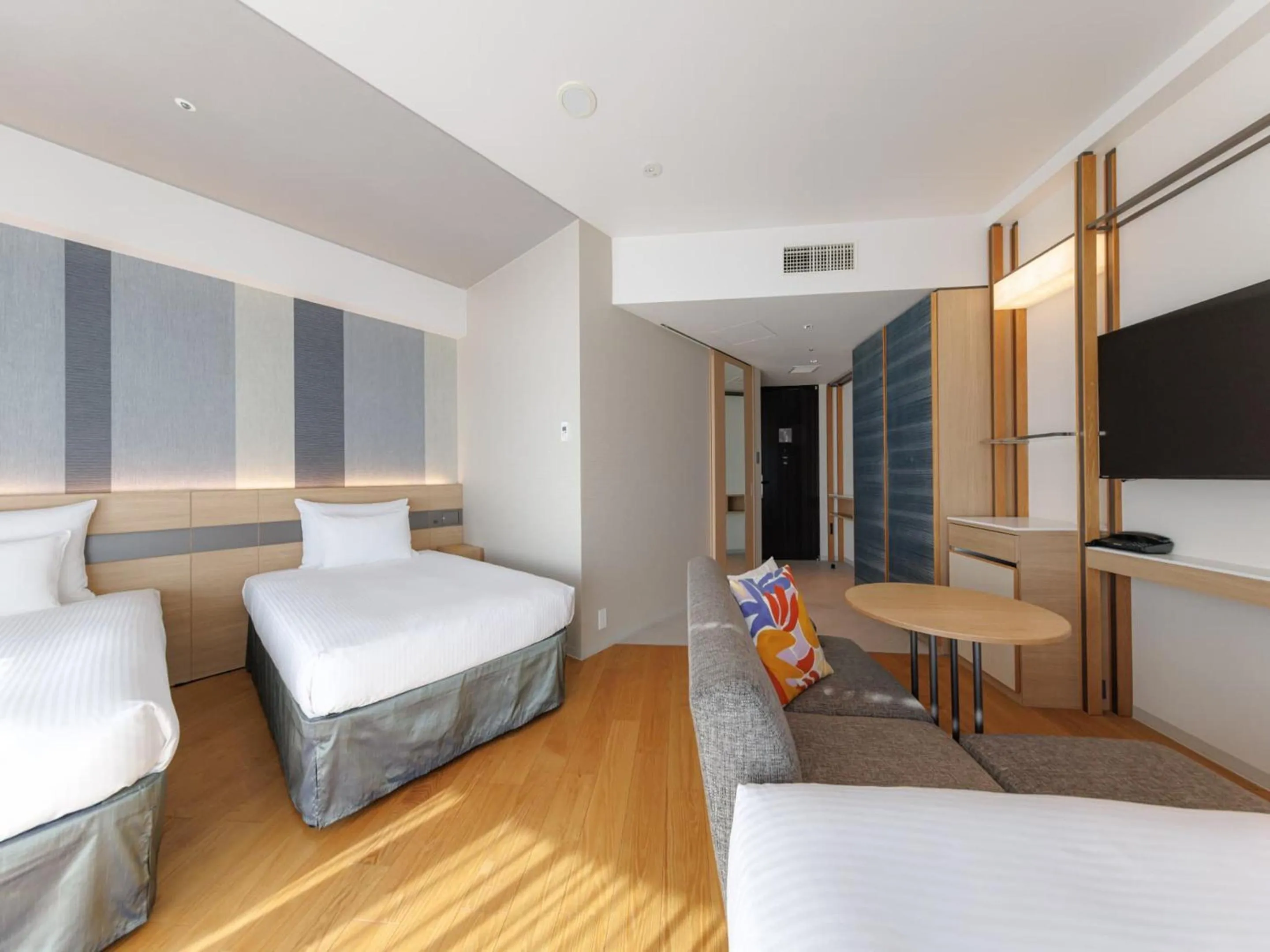 Photo of the whole room, Bed in JR Kyushu Hotel Blossom Naha