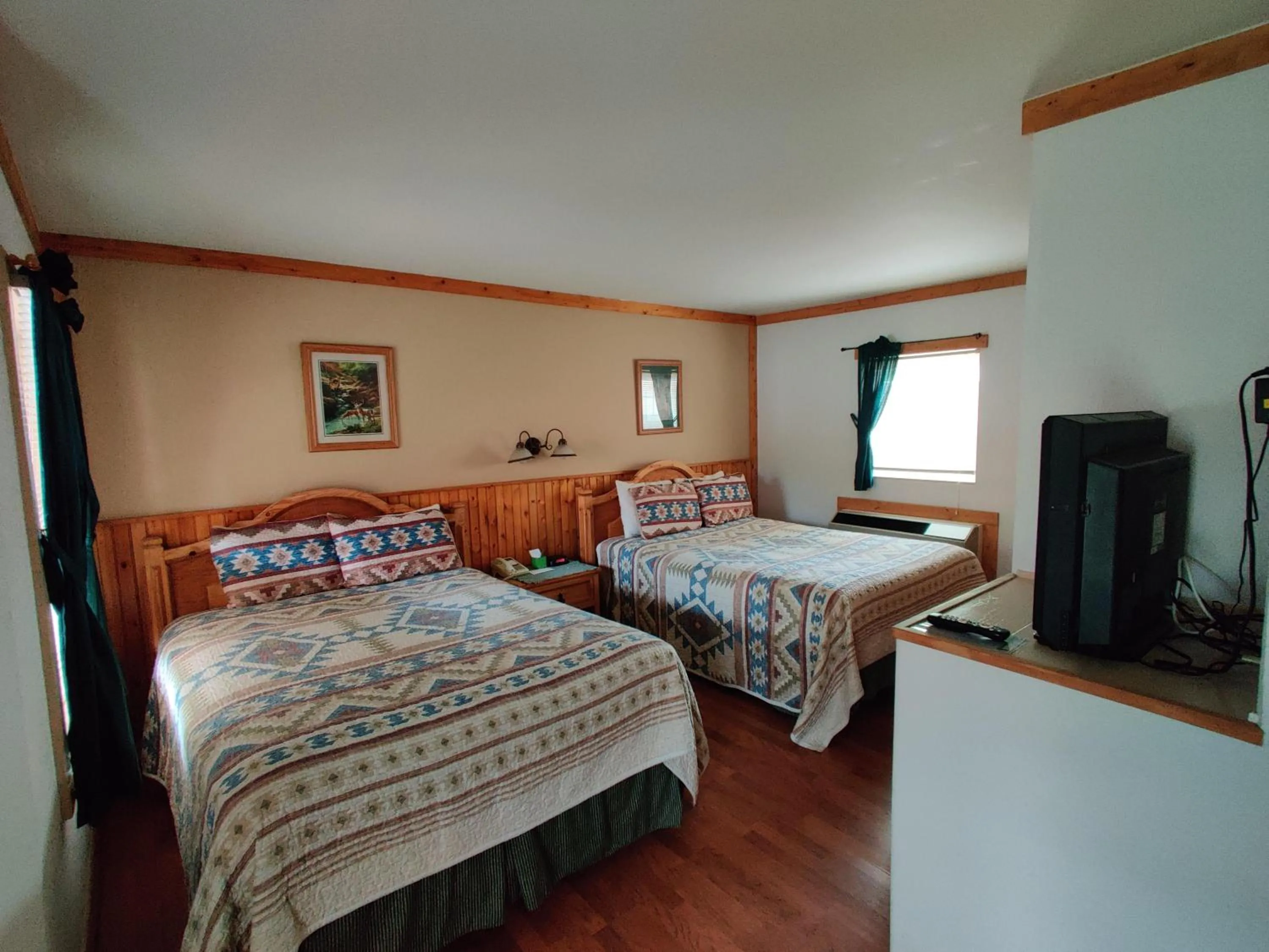 Bed in Smoky Falls Lodge