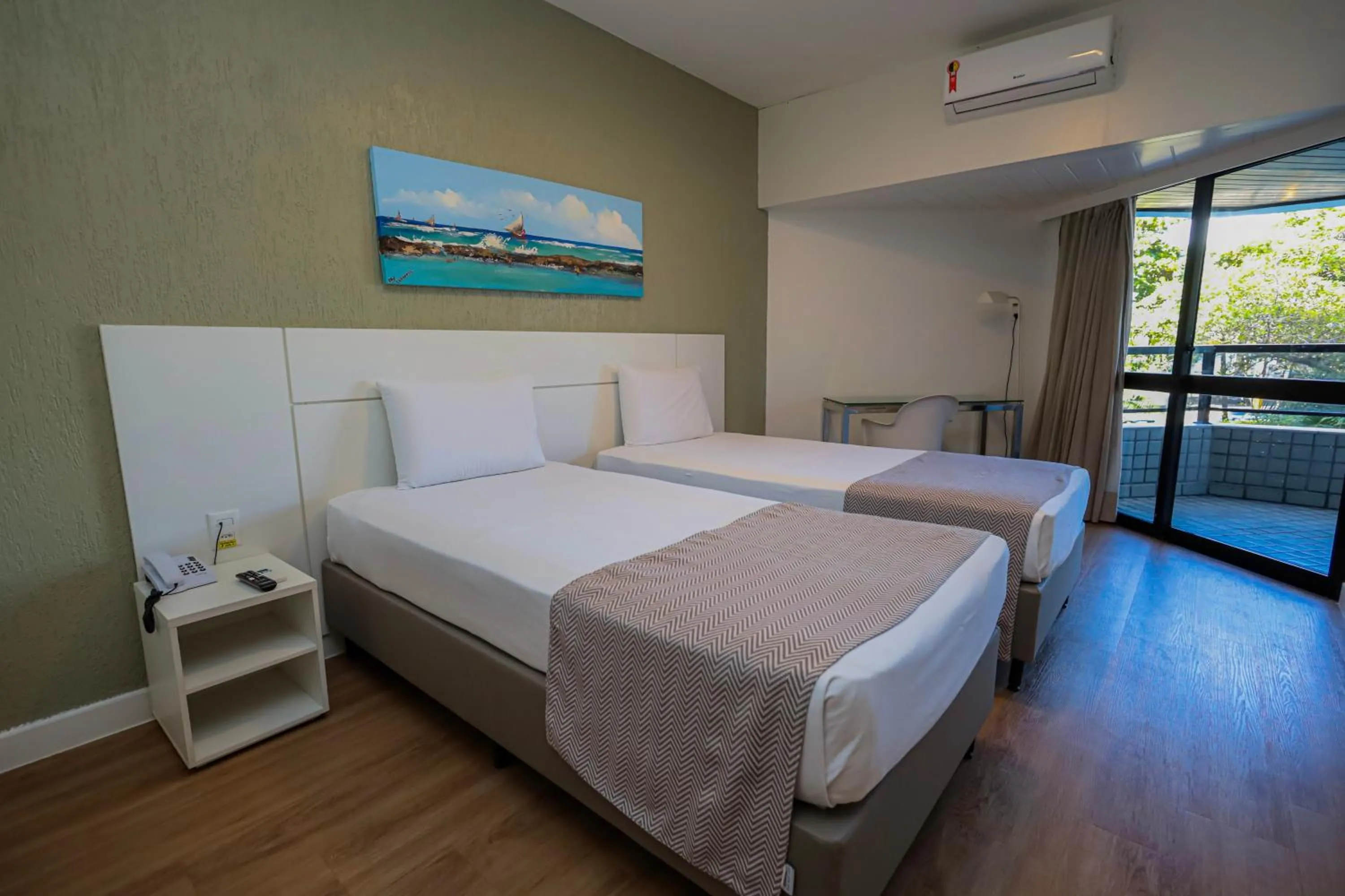 Bed in Maceió Atlantic Suites