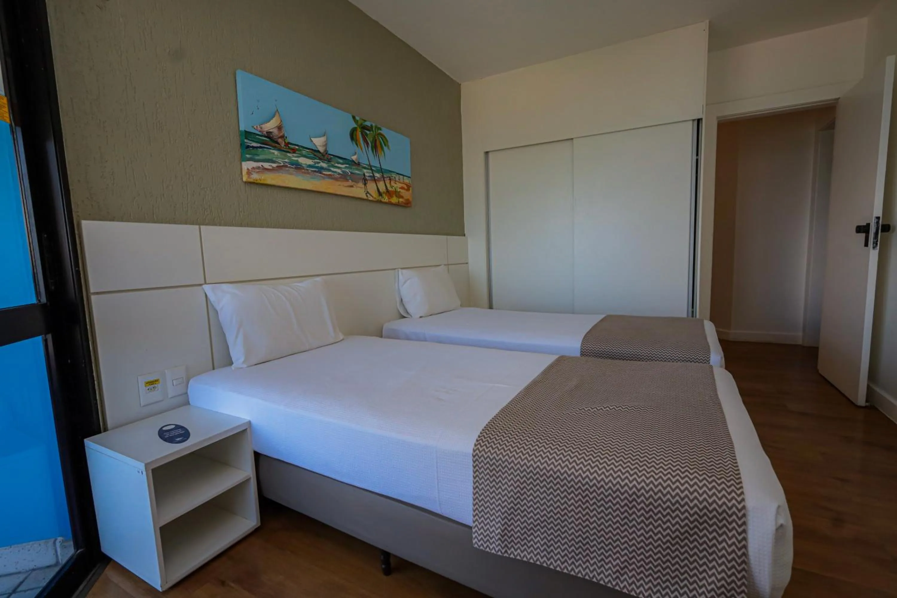 Bed in Maceió Atlantic Suites