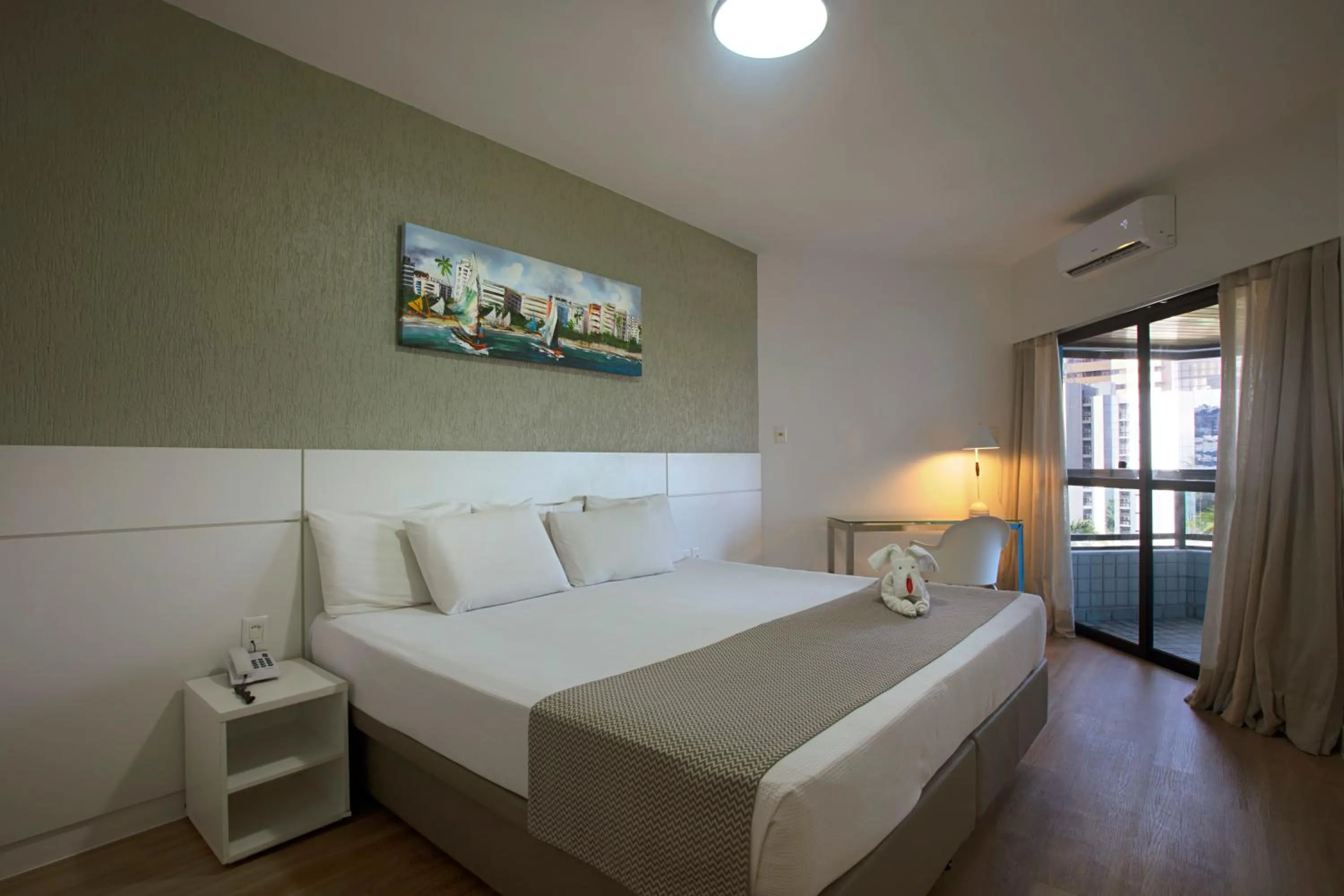 Bed in Maceió Atlantic Suites