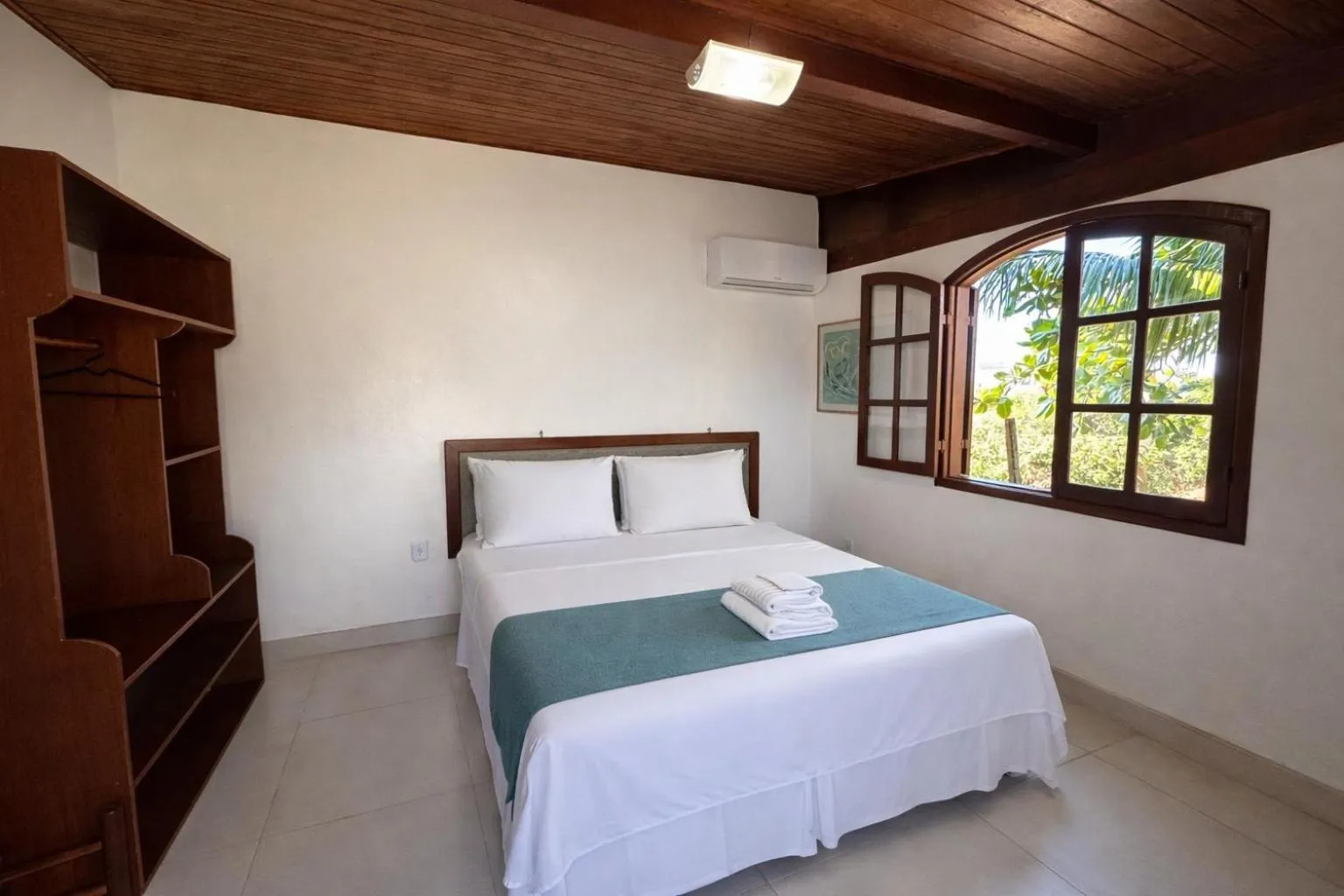 Bed in Pousada Tanto Mar