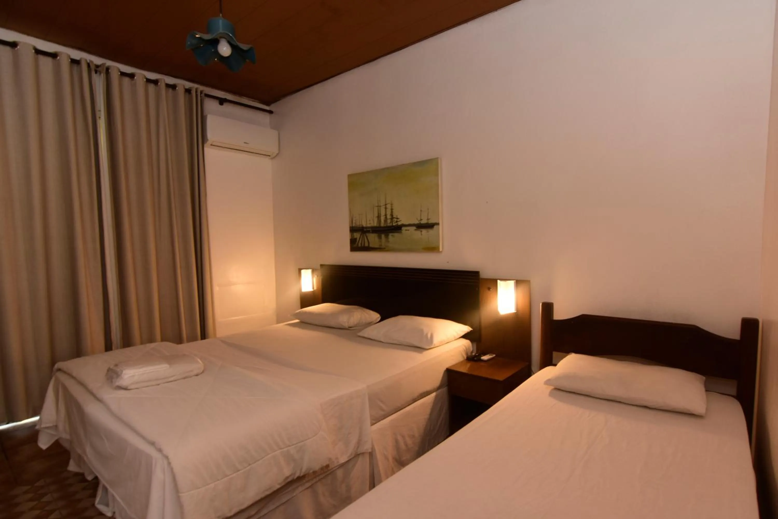 Bed in Pousada Tanto Mar