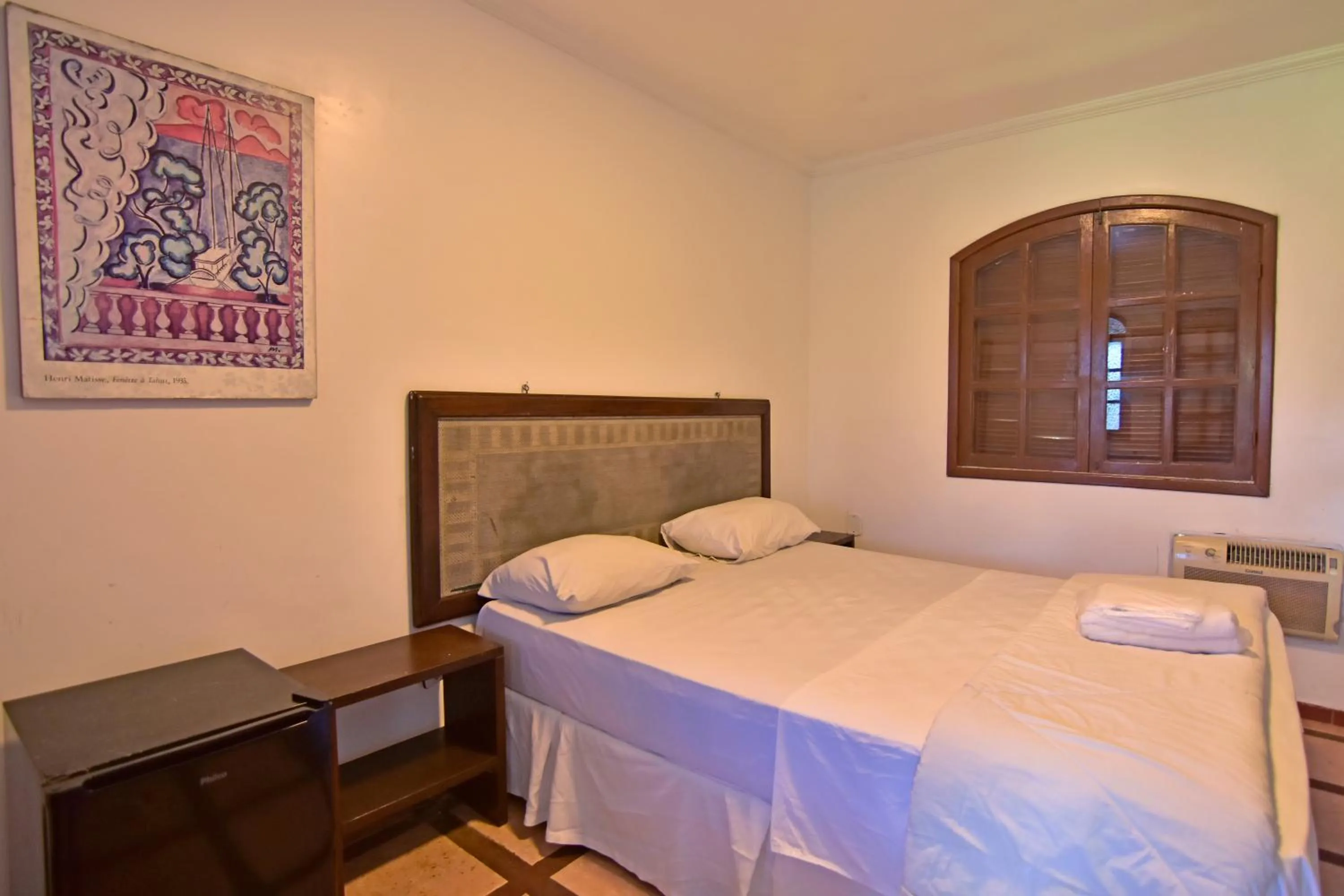 Bed in Pousada Tanto Mar