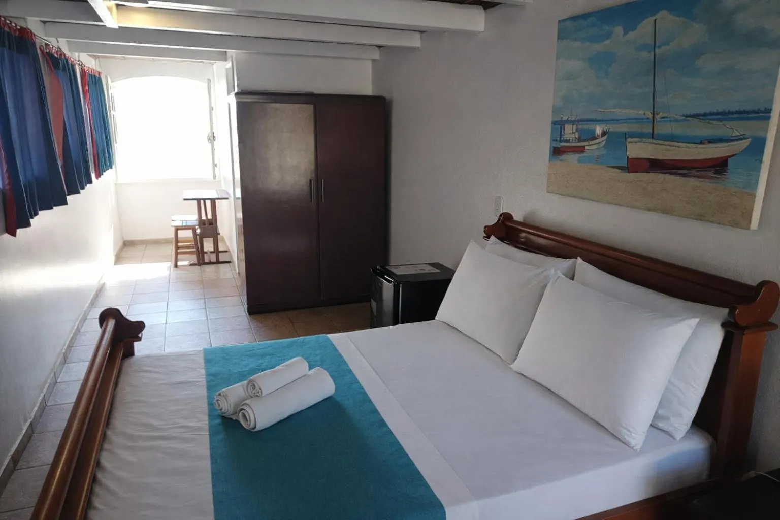 Bed in Pousada Tanto Mar