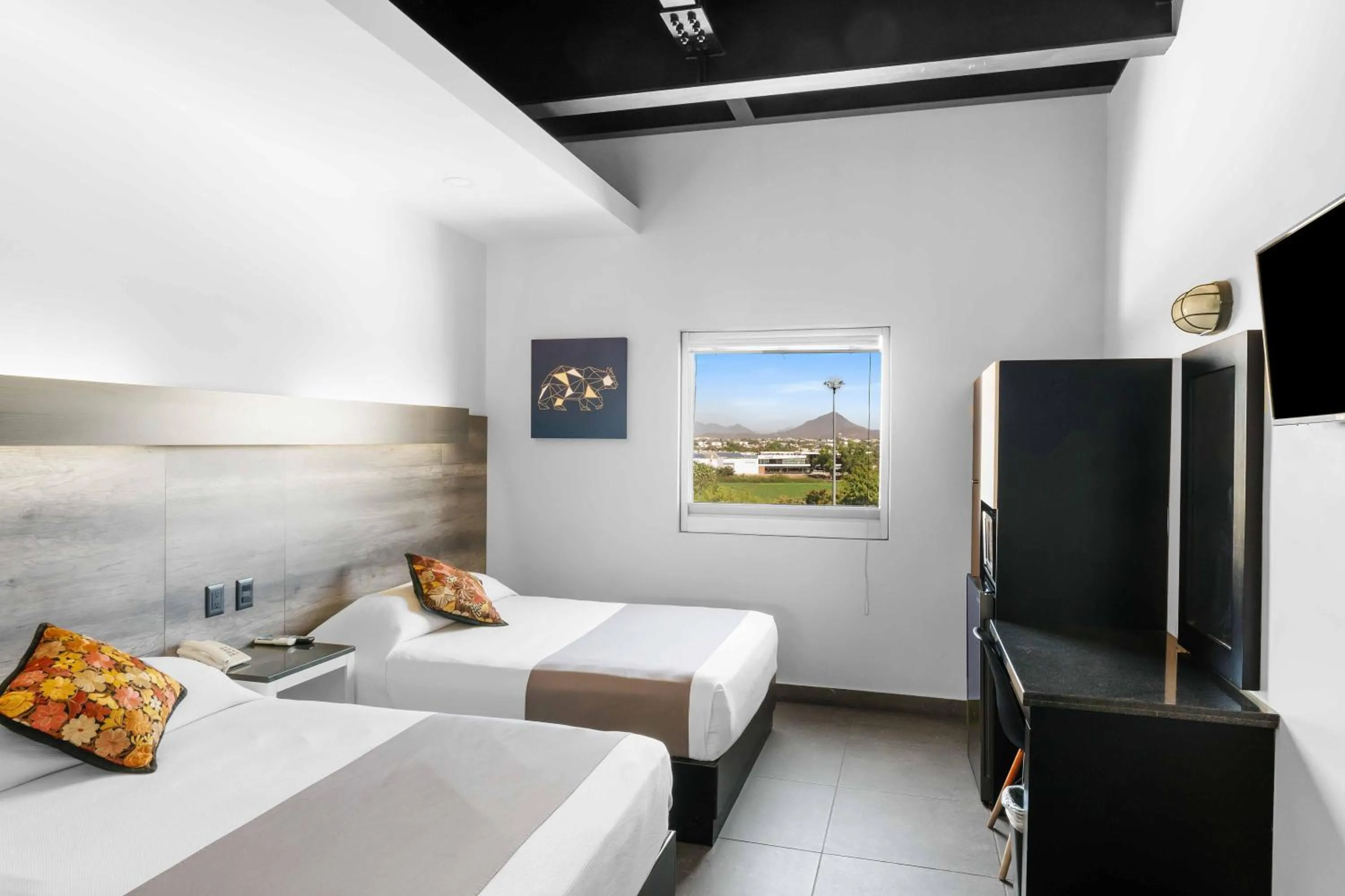 Bed in Homesuites Malecon