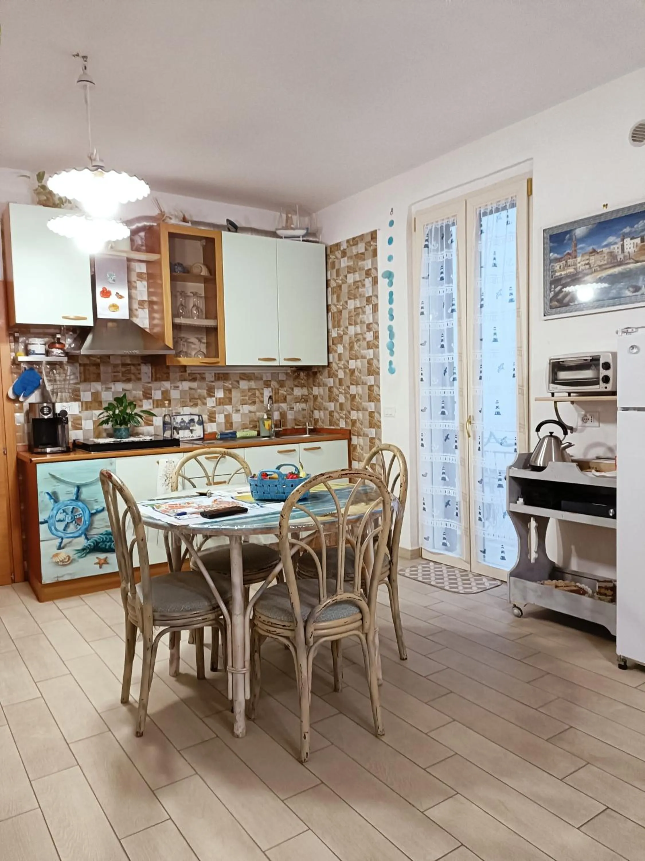 Kitchen or kitchenette in B&B U Mare Mio