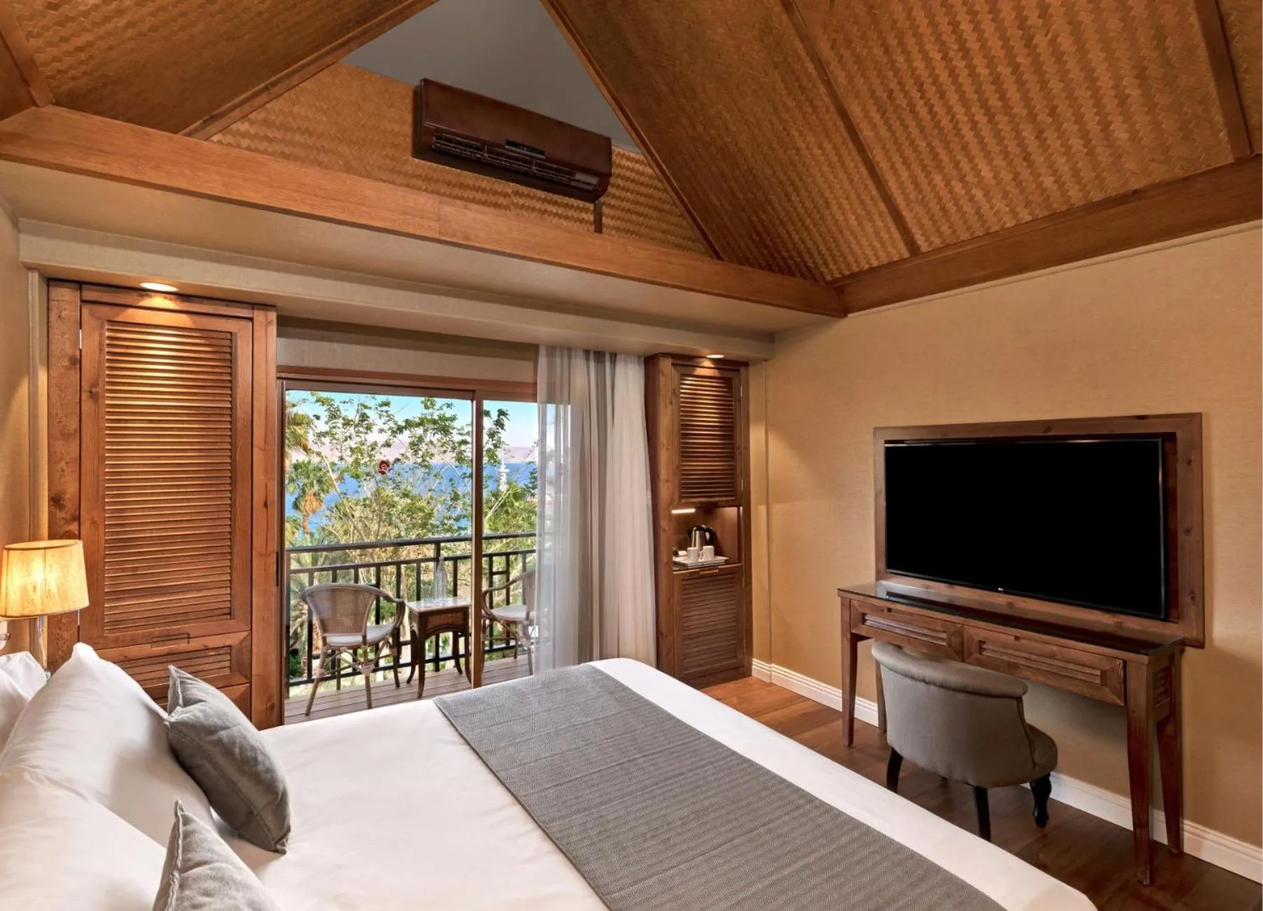 Living room, Bed in Orchid Eilat Hotel