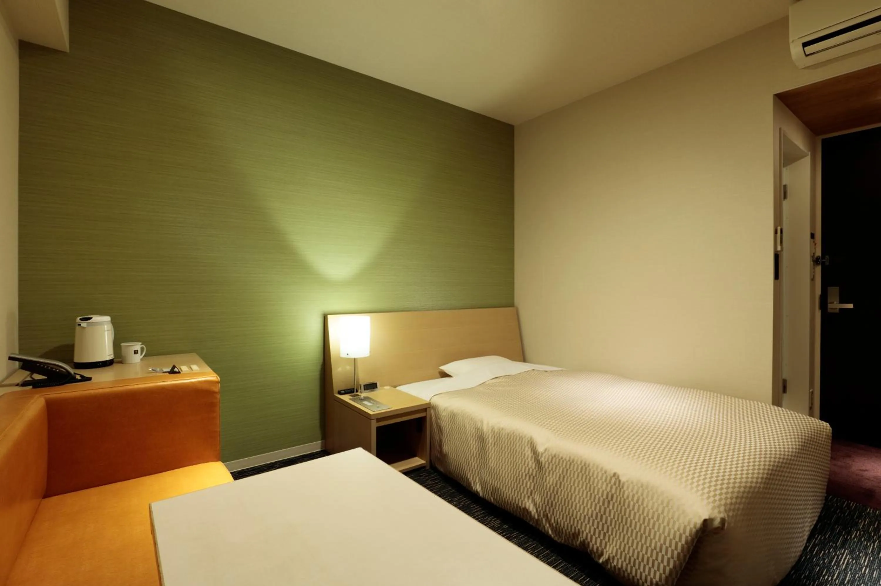 Bed in Candeo Hotels Shizuoka Shimada