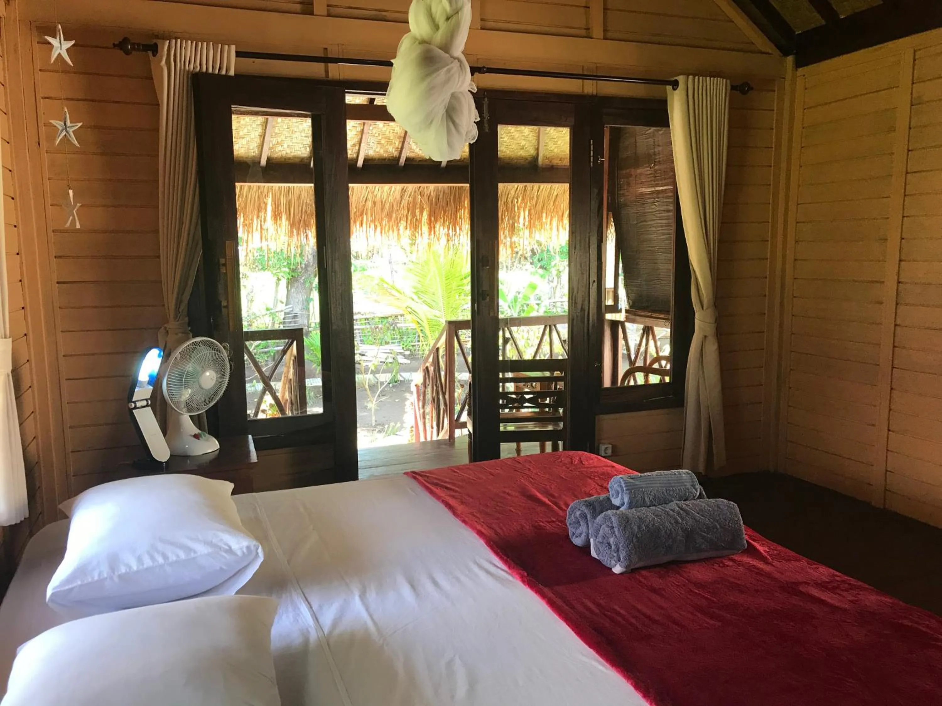 Bed in Meno Madia Bungalows