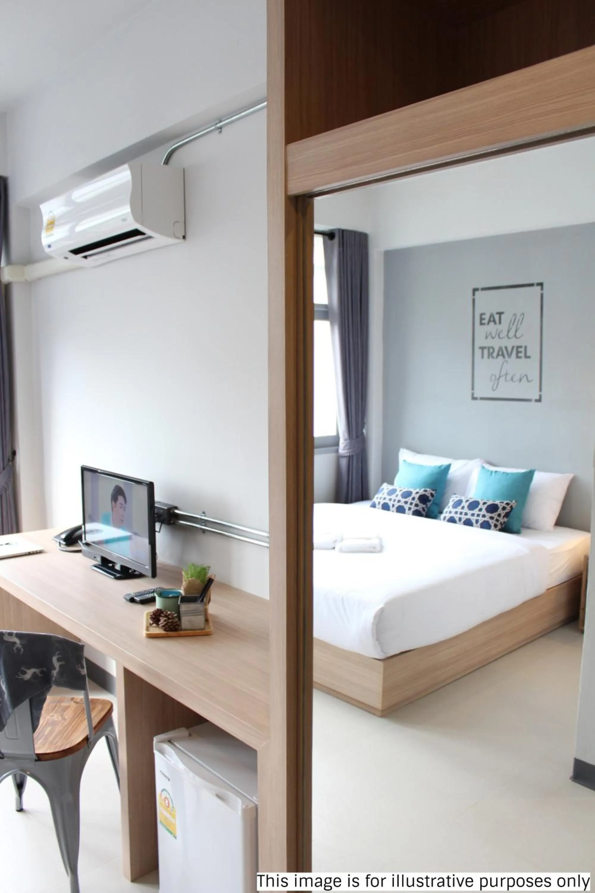 Photo of the whole room, Bed in Rajthani Hotel - SHA Certified