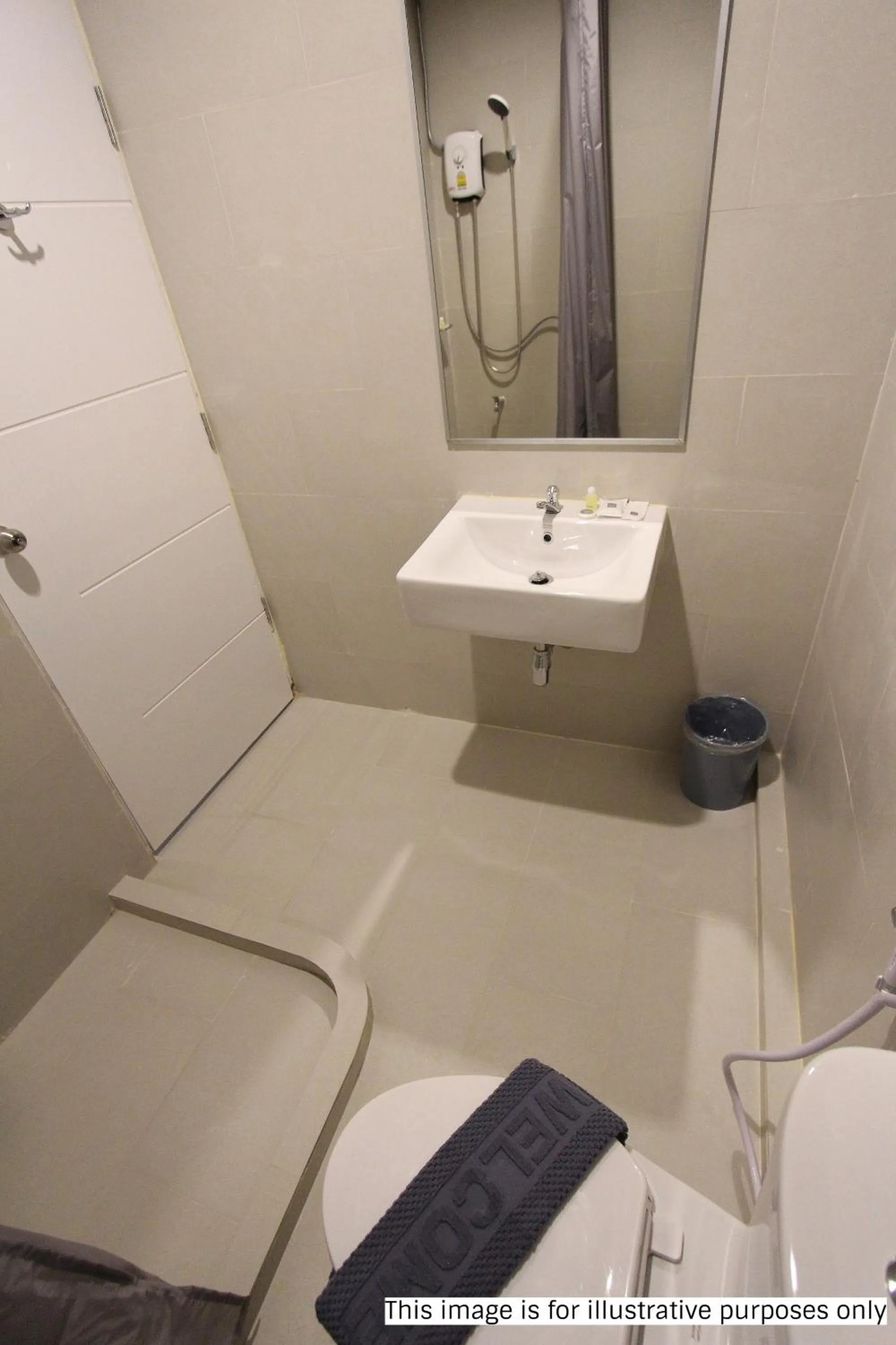 Bathroom in Rajthani Hotel - SHA Certified