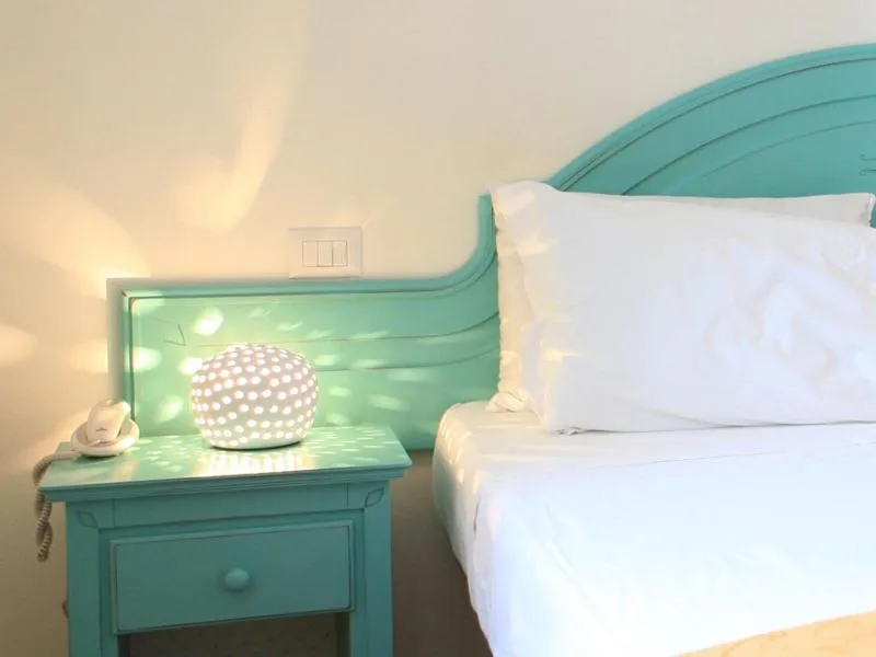 Decorative detail, Bed in Hotel Giardino Giamperduto