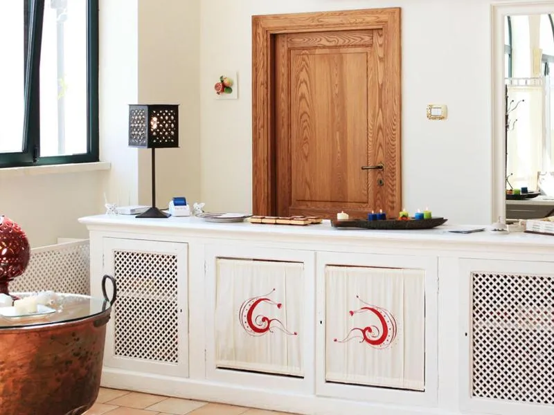 Communal lounge/ TV room in Hotel Giardino Giamperduto