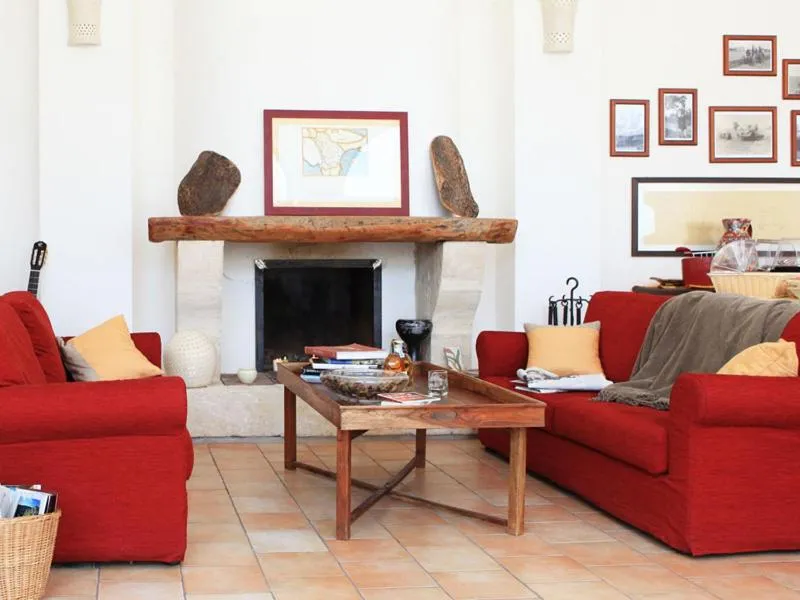 Communal lounge/ TV room in Hotel Giardino Giamperduto