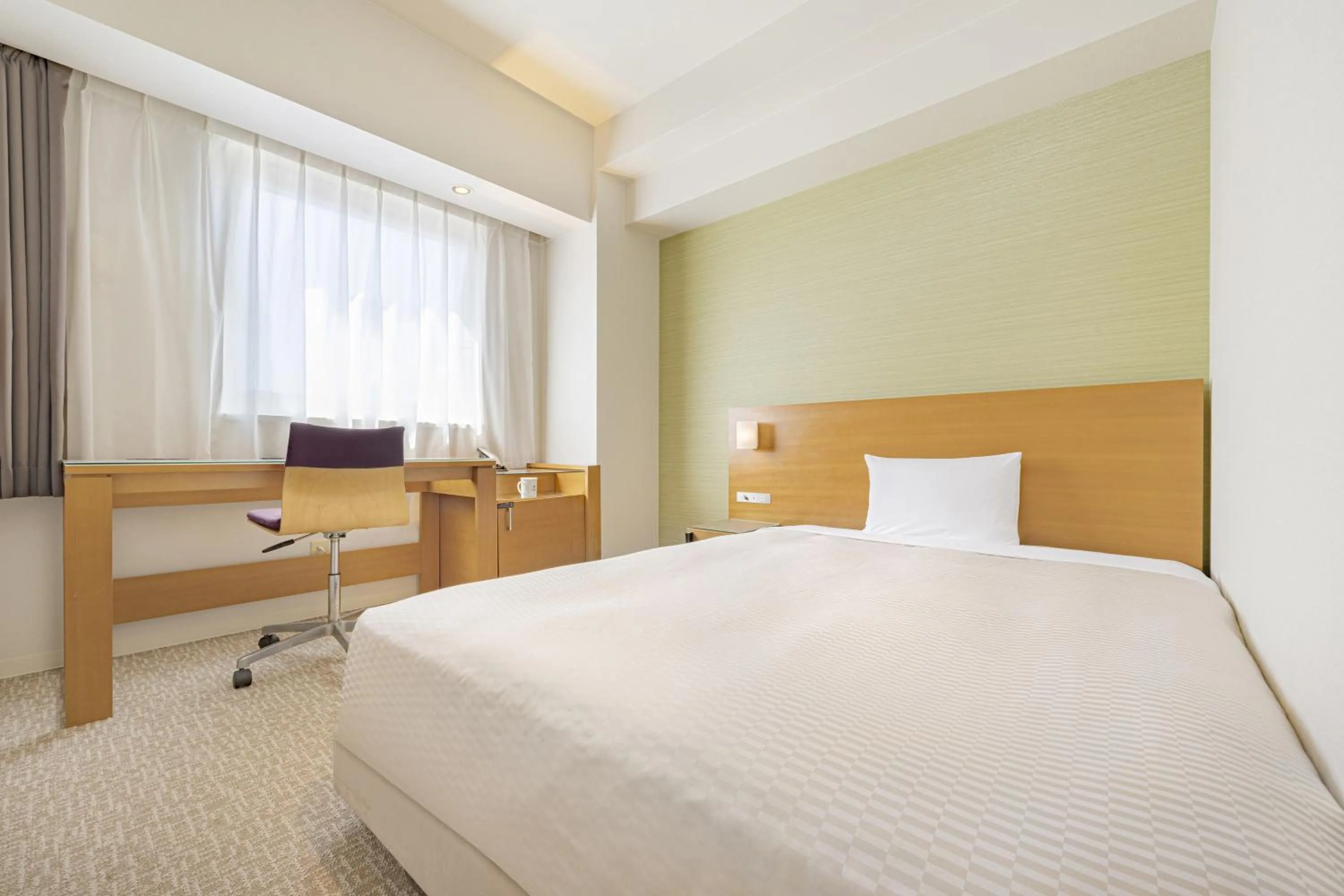 Photo of the whole room, Bed in Candeo Hotels Fukuyama