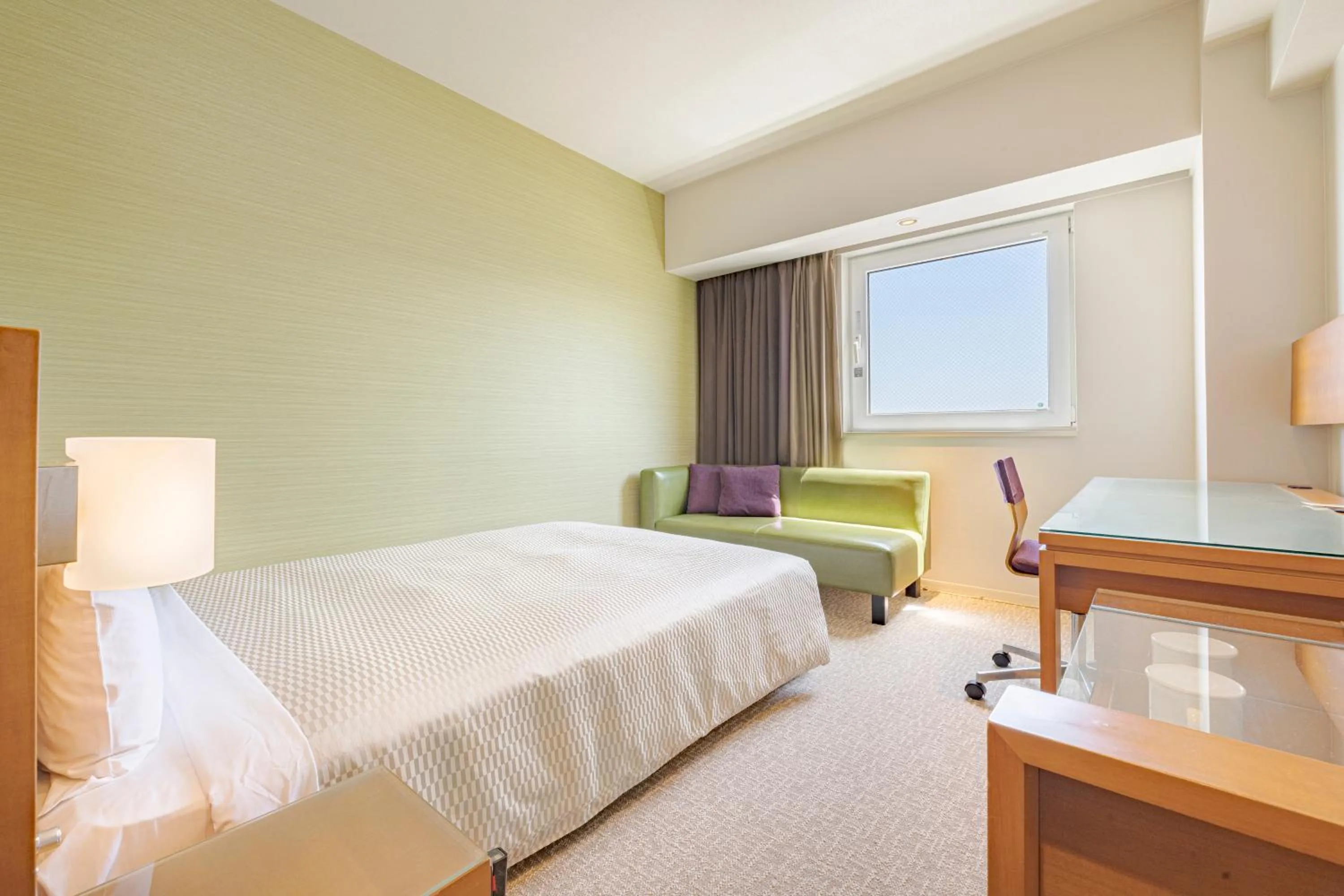 Photo of the whole room, Bed in Candeo Hotels Fukuyama