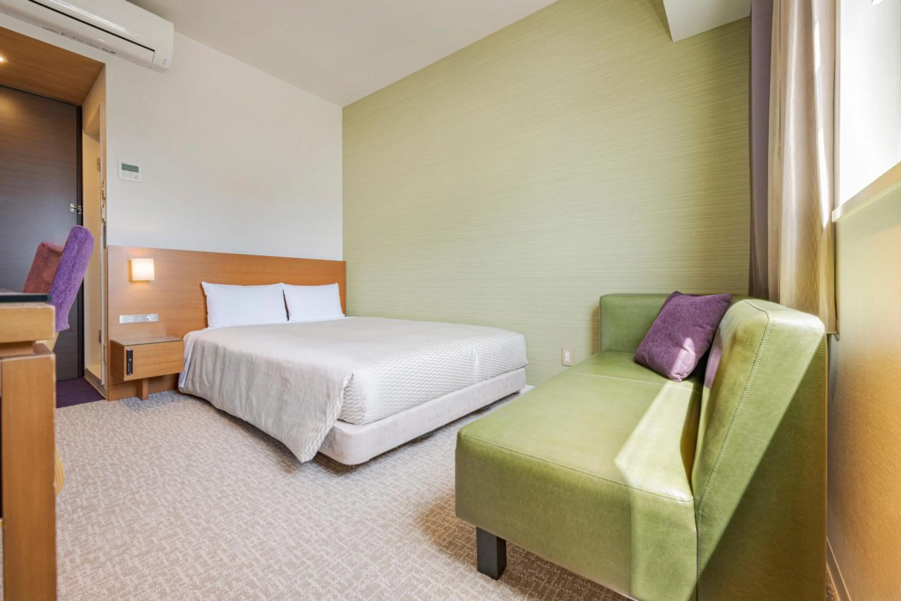 Photo of the whole room, Bed in Candeo Hotels Fukuyama