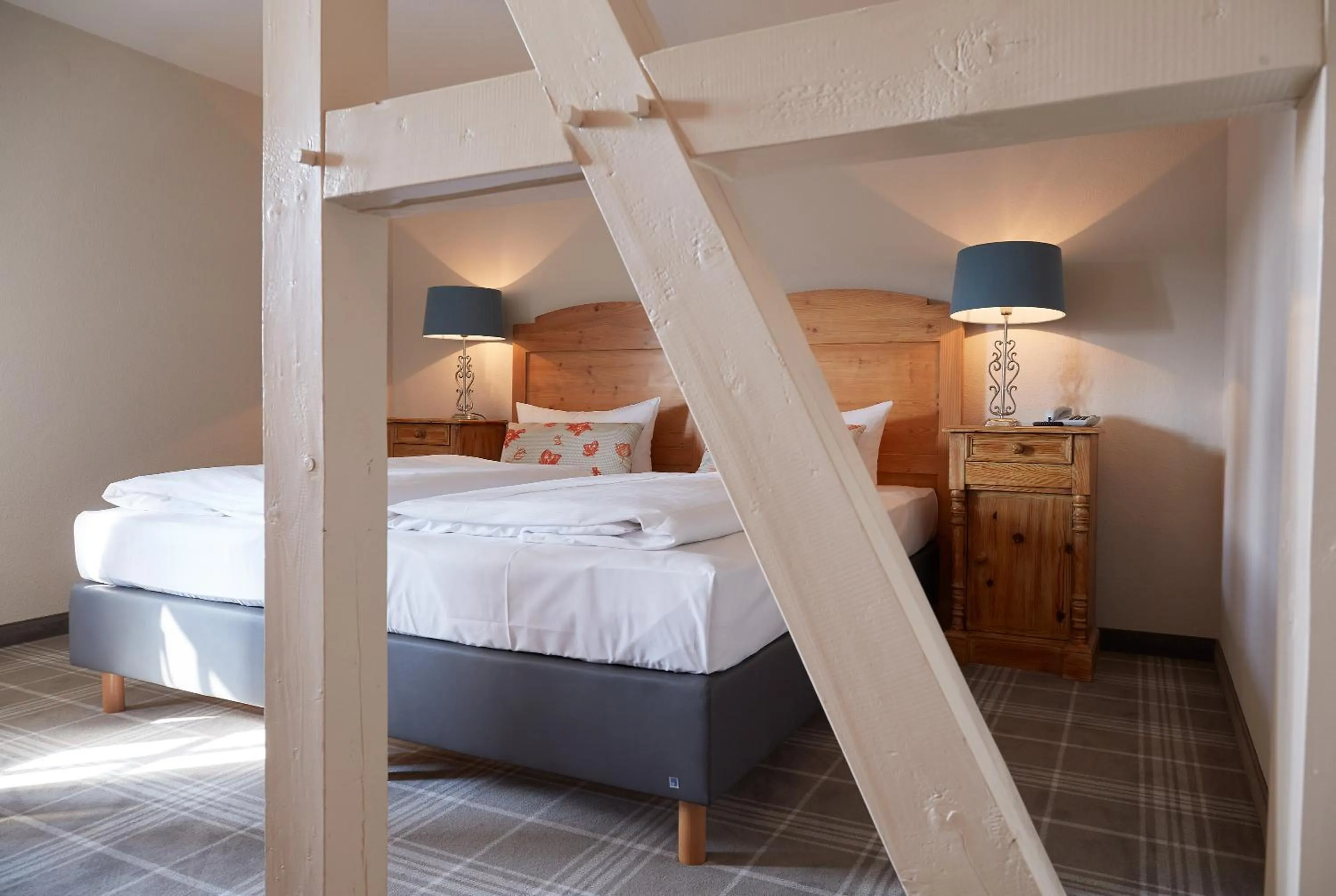 Photo of the whole room, Bed in Gästehaus Warsteiner Welt